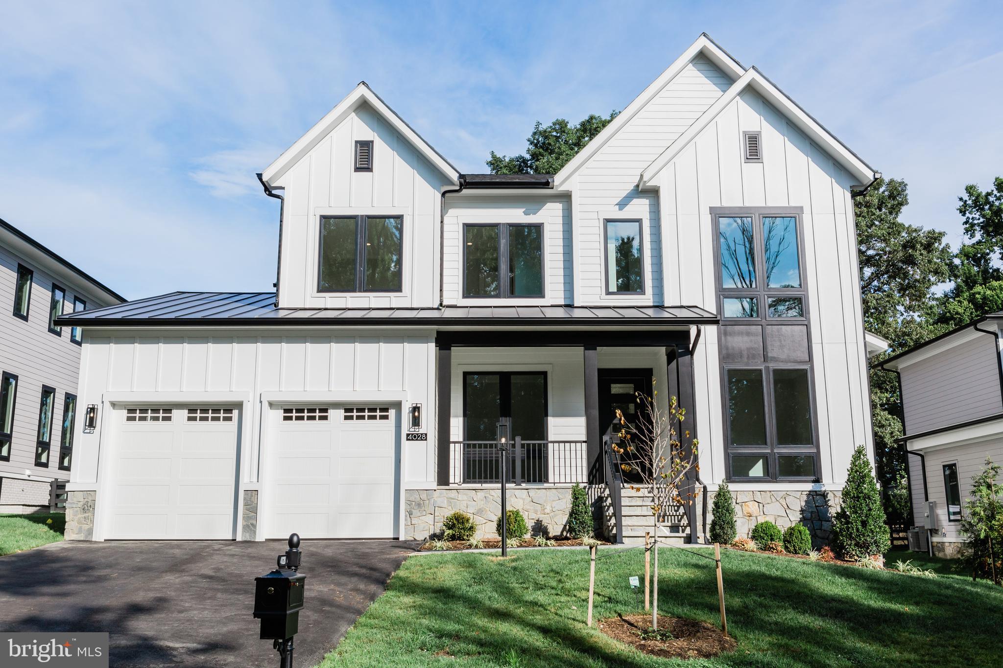 LUXURY LIVING AT RED OAK- SPA, SAUNA, STEAM SHOWER, GYM, PRIVATE BALCONY OFF PRIMARY SUITE, POCKETING SLIDING DOOR TO COVERED PORCH, DECK, 3 FIREPLACES, 2 WETBARS, CHEFS KITCHEN, 10 FOOT CELINGS ON 3 LEVELS......
SEARCH FOR PREMIERHOMES.GROUP IN NORTHERN VIRGINIA. Presenting a truly unique open-concept floorplan on a generously sized 0.36-acre homesite, this magnificent residence spans an impressive 8329 sq ft (inside and outside living area plus garages). With 7.5” European French Oak flooring throughout and 10-foot soaring ceiling heights, this home is a masterpiece of elegance and thoughtful design.
Showcasing remarkable attention to detail, this residence boasts an extensive trim package, featuring 7½-inch baseboards, 7-inch crown moldings, and 4-inch casings around windows and doorways. The sophisticated Quartz countertops in the kitchen and in all seven bathrooms add a touch of luxury, complementing the expansive MI casement windows that flood the entire house with natural light and offer excellent ventilation.  
The kitchen is a culinary dream, equipped with a Top Chef-worthy appliance suite. Stainless steel standouts include a Café™ 48" Smart Dual-Fuel Commercial-Style Range with 6 Burners and Griddle (Natural Gas), a Café™ 48" Smart Built-In Refrigerator, a Café 30” Combination Double Wall oven/microwave, and a Café Smart dishwashing system. The designer kitchen is complete with two-tone Legacy cabinetry, soft-close features, and two stylish island pendant light fixtures, making it the centerpiece of the expansive open-concept family living area.
Designed for seamless indoor/outdoor living, the home features an ample Trex deck with a Pella pocketing 5-panel sliding door, seamlessly extending the living space into an attractive all-season outdoor gathering area. To customize your deck, there’s the popular option to add Phantom motorized retractable screens, ideal for any climate or season, disappearing at the touch of a button.
The main level is complemented by a private in-law suite, strategically located for convenience and accessibility. This thoughtful addition eliminates the need for stairs, making it an ideal arrangement for those seeking both privacy and proximity to the heart of the home.
Extra-wide staircases enhance the grand and open feel, ensuring the upper and lower levels are easily accessible and effortlessly integrated into the overall flow of the home. The upper-level features four curated bedroom suites, each designed to cater to the individual needs of residents and guests.
The Owner's Suite is a luxurious retreat, opening to a charming screened-in porch—a perfect spot to savor morning coffee or unwind in the evening breeze. Inside the suite, a well-appointed sitting area, cozy fireplace, and wet bar create a private retreat. The Owner's Bath features heated floors, a spa-like steam shower, two toilet rooms, and two expansive walk-in closets. The centerpiece of this retreat is a Stargaze freestanding tub, offering a space for ultimate relaxation.
The lower level is a haven for wellness, fitness, and entertainment. A lavish steam room and dry sauna provide a spa-like retreat, complemented by a padded floor gym for invigorating workouts. The stunning waterfall quartz wet bar adds sophistication to the entertainment space, fully equipped with a beverage fridge, microwave, and dishwasher.
The 6th bedroom suite on the lower level offers privacy, featuring a generously sized closet and a beautifully appointed en-suite bathroom. The three-car garage is equipped with an electric car-ready charger, epoxy-coated floors, and strategically placed windows for natural light.
The home is ideally located in a family-friendly community, surrounded by excellent schools, parks, and amenities. With easy access to major highways, commuting is a breeze, allowing for more quality time with loved ones. Google Premier Homes Group LLC in Northern Virginia to find our portfolio of homes.