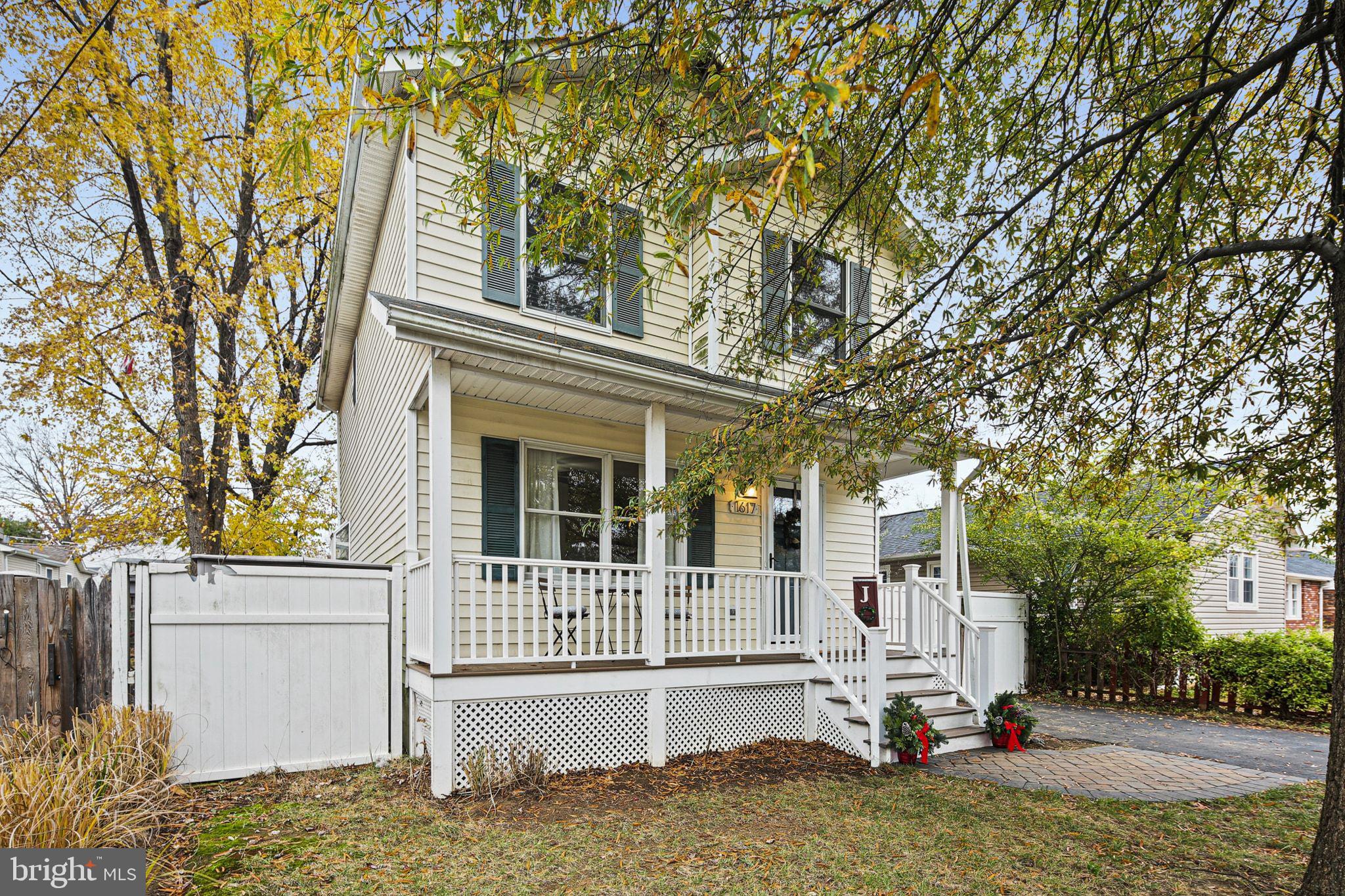 PRICE ADJUSTMENT! Front Porch Two-Story Home in popular Woodland Beach! Built in 2000, this 3 Bedroom, 2.5 Bath Home is located just blocks from access to Woodland Beach amenities and Glebe Bay/South River. Spacious Open Living Room w/Country Kitchen boasting Stainless Appliances, Granite/Butcher Block Counters/Atrium Window at Kitchen Sink & Ceramic Backsplash. Charming Sunroom off the Kitchen Luxury Laminate Plank Flooring thru-out Main Level. Upper Level boasts 3 Bedrooms including a Primary Suite. Primary Bath with Shower. Fully fenced Backyard with Storage Shed. Driveway parking for 2 vehicles, Double Gate Entry to backyard for Small boat/Jet ski storage. Private Well/Public Sewer. HVAC replaced 2018, located in the Crawl Space. One Year AHS Home Warranty - Shield Complete Plan valued at $1005 Included!
