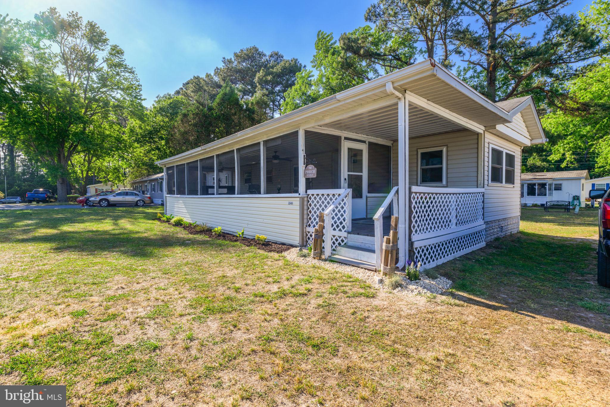 An unbeatable bargain at this price, this recently updated home invites buyers to enjoy a lifestyle amidst a community rich with amenities like multiple marinas, boat slips, jet ski slips, private beach pier and fishing. Relax on your screened porch after a day on the beach. Enjoy your favorite sport courts whether it be volleyball, basketball, tennis, or pickleball.  This beach home is perfect for weekend escapes or full-time living.
 
Contingent on park approval. 
Lot rent: $781.14