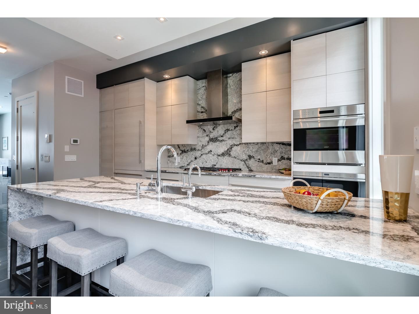 Three homes already sold!! get in before any price increases! One of a kind New Construction with Elevator, 2-car garage, 4 Decks including two Roof-decks, Smart-home tech system, 4500sq' of Luxury and most finely appointed details in the city. Liberty Estates  Townhomes has it all. Included in this sophisticated home is a theater room, and a game room with large wet bar that's perfect for entertaining. The living room, dining area and living room has heated floors. The wide open and extra wide living area has a built in fireplace with stone ledge, and this magnificent space spills onto a rear tiled deck that will make you feel like you are in Miami. The kitchen is spectacular, with Sub Zero and Wolf appliances, custom Italian cabinetry, custom counter tops including a HUGE island with cascading waterfall stone edge and a custom floating ceiling with accent lighting. The extra wide, 20' wide floor plan allows for a huge dining area right next to the kitchen. The interior iron railing system continues throughout the home along an elegant Black Walnut wood staircase. The roof decks are equipped with a kitchenette with sink, fridge and built in grill. The private deck off the master suite, and the deck off the living room supply a ton of outdoor square footage,  totaling over 900 Sq feet. All of the bedrooms have great space and have ample walk in closets and accompanying bathrooms with the finest Grohe and Kohler finishes. The full floor master suite has it all, a six foot Kohler soaking tub, heated floors, double vanity, glass tile shower, deck and huge closets. Each bathroom is unique and has only the best materials. The woodwork throughout the home is stunning- including the custom baseboards and solid wood doors t/o. This may be the most well thought out home in the city. Not one inch of space has been wasted. Come visit our 100% complete and ready to be lived in Model home. Still time to customize the other homes in the development. 10 year tax abatement pending!! 100% complete and ready for move in !!