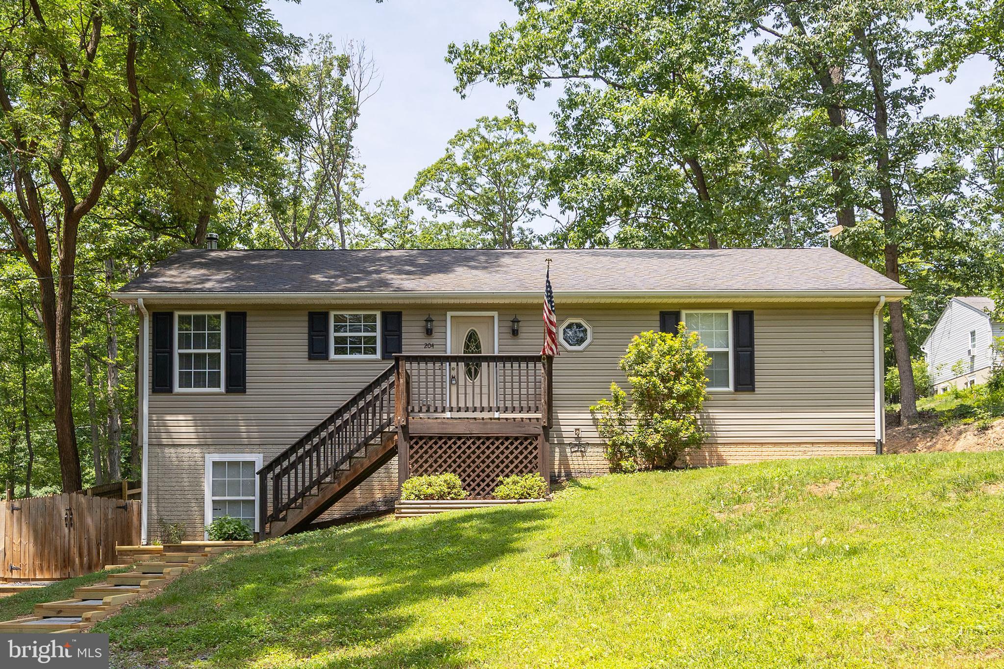 Adorable rancher in Shawneeland with access to a lake, trails, beach, and fishing.  Ideally you wish for spacious living quarters,3 bedrooms, 2 full baths, and a walkout basement with a finished room for gym/office/den..well we have all that and more so come take a gander and make it your own before the summer ends.