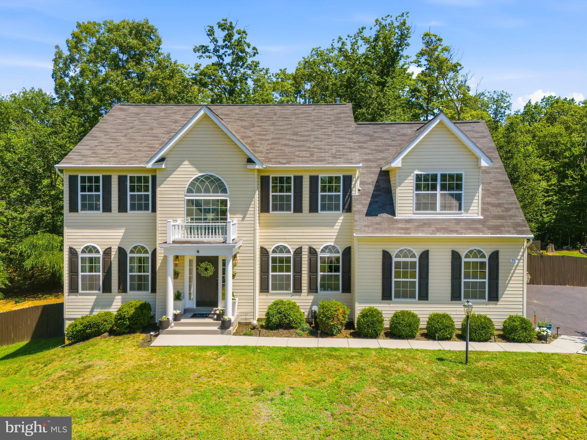 Welcome to 90 Maplewood Drive, where modern comfort meets peaceful country living on 2.22 private wooded acres. This beautifully maintained home offers three finished levels designed for everyday living and entertaining. The heart of the home features a spacious kitchen with granite countertops, stainless steel appliances, and ceramic tile flooring, opening to inviting living spaces highlighted by a cozy gas fireplace and custom built-in cabinetry.
Step outside and discover the true showpiece of this property. A stunning stamped concrete patio with a built-in outdoor fireplace creates the perfect setting for relaxing evenings and entertaining guests. Venture farther into the wooded backyard to find a custom family gathering area complete with a fire pit and multiple swings, creating a one-of-a-kind outdoor retreat where memories are made.

Surrounded by nature and abundant wildlife, this property offers the tranquility of country living while remaining conveniently located just minutes from the VRE, Stafford Hospital, shopping, dining, and commuter routes. A rare opportunity to enjoy privacy, recreation, and convenience all in one exceptional home.