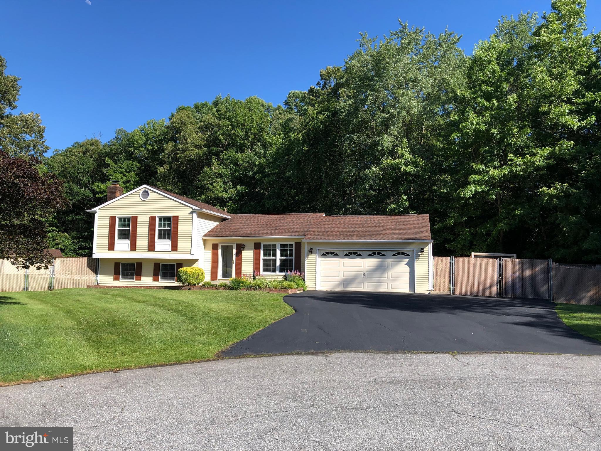 Very nice home that welcomes you as soon as you drive up!  This home sits back just enough from the cul-de-sac to allow the beauty to show with good space between the neighbors.  You can see the Love and care for this home by the owner's from the outside to the inside.  Beautiful and easy to care for  hardwood  and title floors on all 3 levels.  All Kitchen appliances recently updated, granite counter top and ceramic floor, recess lighting and upgraded new kitchen cabinet's with ambient light under the cabinet for that extra light and special effect.  Nine light door to porch for easy access and  family entertainment.  Master bedroom and bathroom recently painted and updated, neutral color shower and floor tile.  Good size 2nd bedroom.   All bedrooms with center ceiling light and fan upgrades. Updated hall bath shower and floor.  Large cozy family room with brick fireplace and wood stove insert.  The double windows in the family room brings in a lot of natural light.  The family room is also serviced by updated half bath the utility area and 9 light access door for easy access to the back yard.   Large screened enclosed porch invites family together's and just relaxed living.  Concrete walkway and area surrounding  pool allows for easy access without the grass and dirt getting on your feet or in the pool.   Large low level deck offer shade trees next to the pool for the lazy summer day's and enjoying the pool with family and friends.  Large freshly sealed driveway offers tons of parking for entertaining or if you have the extra boat or RV you like to keep in front or behind the fenced paved area.   NO HOA fee's, NO front foot charges and NO school excise TAX.  Just easy living at your own oasis!!  Great for the family with a lot of toy's like RV,Boat,ATV's, and a few extra cars or trucks.  A place you will  love to call home!