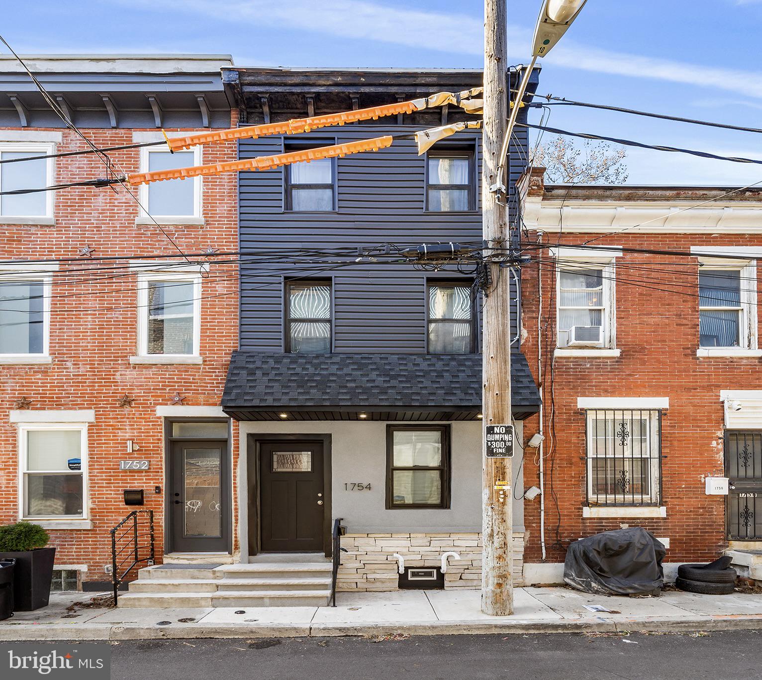 Welcome to 1754 Waterloo Street on the border of the popular Olde Kensington neighborhood where it meets vibrant Fishtown. This recently renovated townhome features THREE generously sized bedrooms and TWO full luxurious bathrooms. Upon entering you are greeted by warm luxury vinyl flooring, exposed brick and a gorgeous state of the art kitchen with floating shelves, stainless appliances, quartz counters, island seating and a wine refrigerator to accomodate 10 of your favorite bottles. Beyond the rear door is a private patio space perfect for BBQ-ing and alfresco dining. The 2nd Floor houses two bedrooms each with their own closet as well a spacious hall bathroom with a glass enclosed shower and convenient stacked washer/dryer. The entire 3rd floor is the  primary suite with a large walk-in closet and spa-like bathroom including soaking tub and large custom-built shower. The location can't be beat with a Walkscore of 93 meaning many conveniences and neighborhood hot spots are just steps away. This location also makes commuting a breeze with easy access to public transportation including the Market-Frankford Line in addition to numerous bus routes and I-95 access within several blocks. Make your appointment to see this great property today!