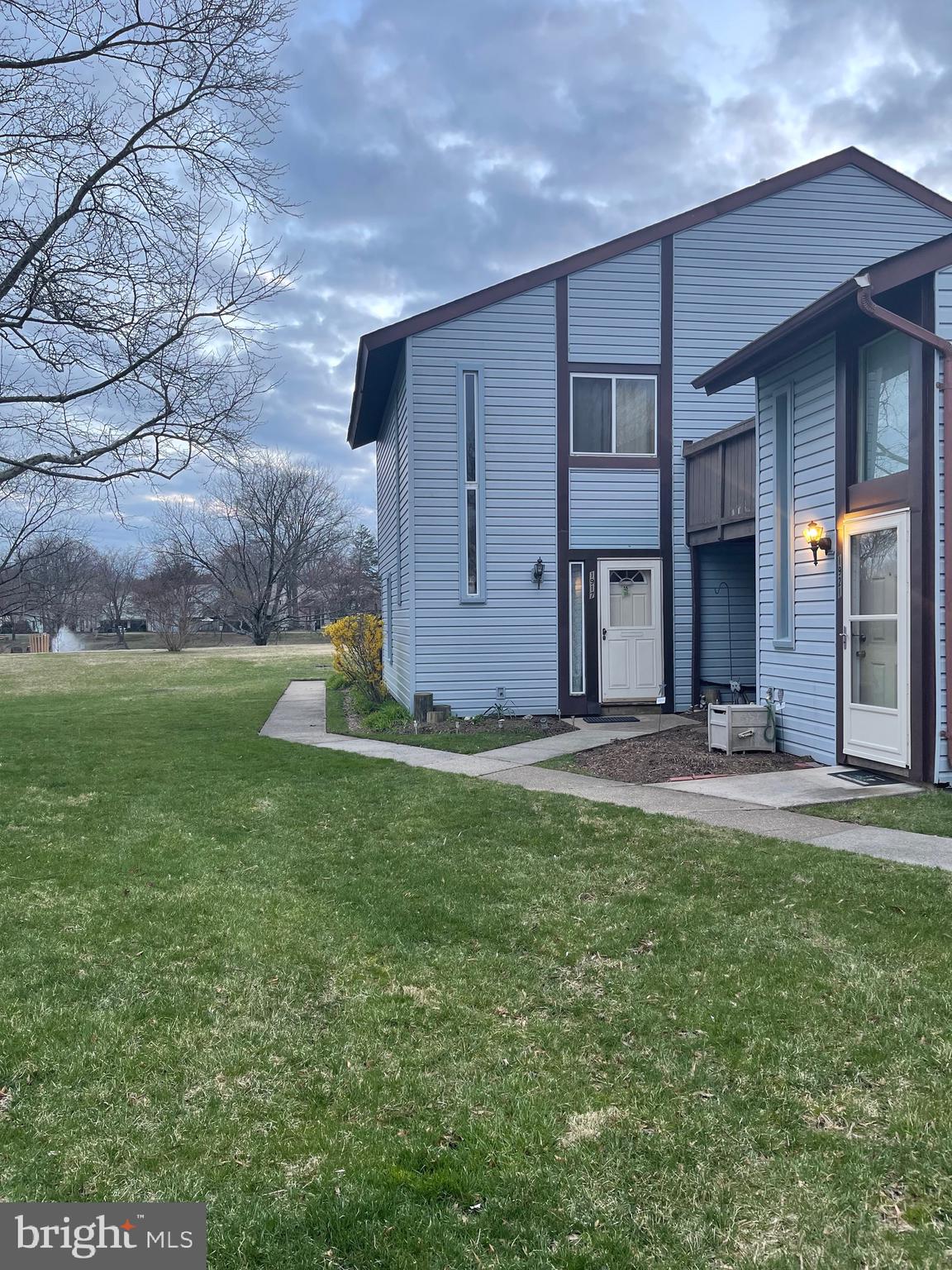 Welcome to 1921 Everglade Ct.  This cozy condo is situated in a serene spot near a pond.  Enjoy walks around the pond or feeding the ducks.  Parking is a breeze for you with an attached garage and driveway.  Enter on the lower level, where easy to clean floors can catch the day's mess.  Head up to the main level and prepare for the main event.   The condo features 3 bedrooms and 2 full bathrooms.  The primary suite is a relaxing sanctuary.  With a walk-in closet and full bath, consider it your oasis.  Although the deck needs a little TLC, it can be a great spot for outdoor entertaining.  Come see what this cozy cutie has to offer.