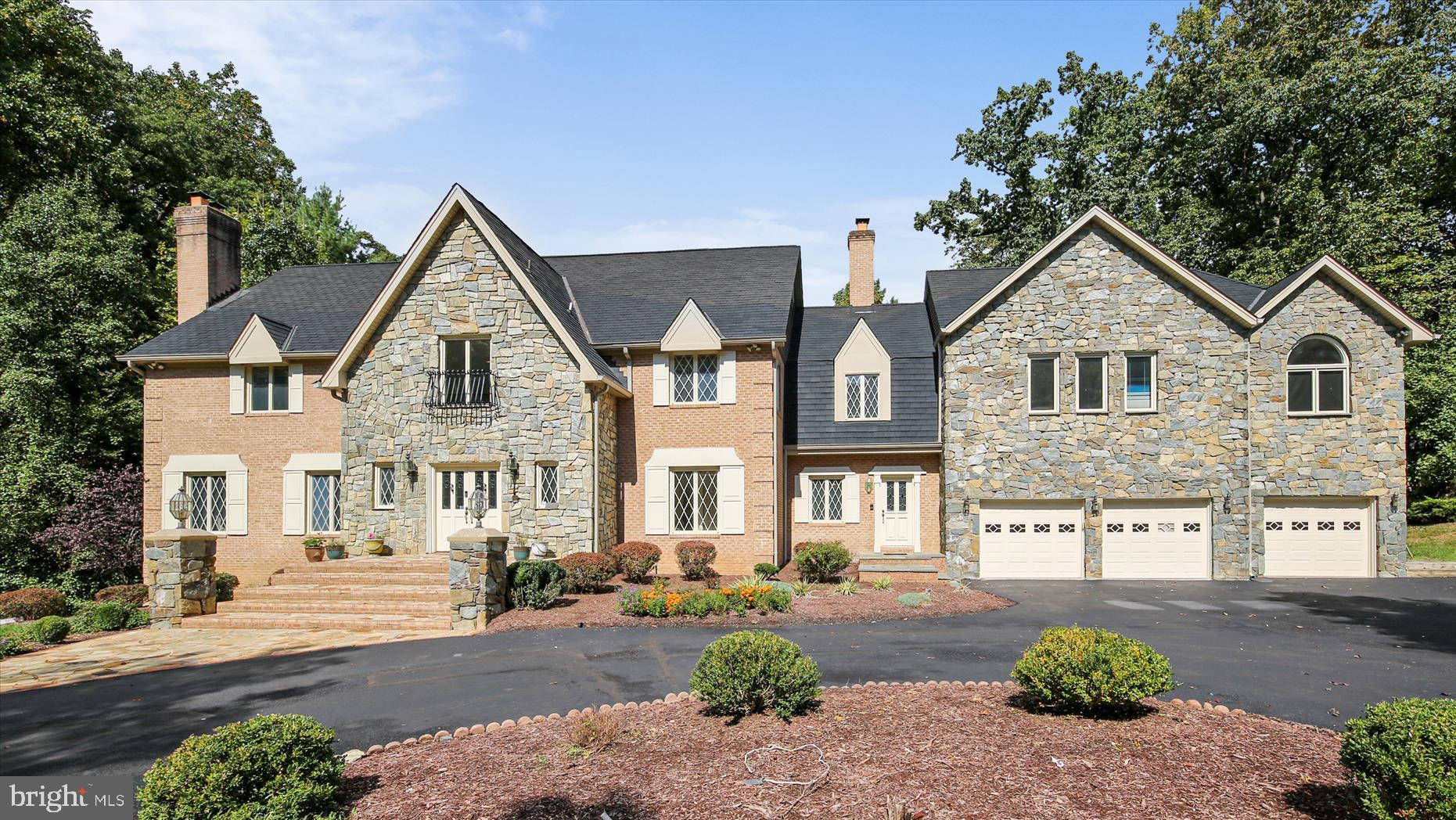 **Sold with multiple offers by Carl Becker at Premier Properties** This Normandy inspired Colonial in one of Potomac's prettiest neighborhoods was custom built by the current owners for unparalleled entertainment and comfortable multigenerational living. Over two acres of land offers circular driveway, large grassy areas, and private swimming pool. The dream kitchen with large island opens to the great room and family room.  A dramatic balcony and upstairs family room overlook the great room and two story foyer. The walkout lower level offers spacious recreation room with full bar, multiple bathrooms, and aupair suite with second kitchen. Other details include 5 bedrooms upstairs, 4 fireplaces, 3 car garage, over 2 acres, and ready for 1 lucky new owner!