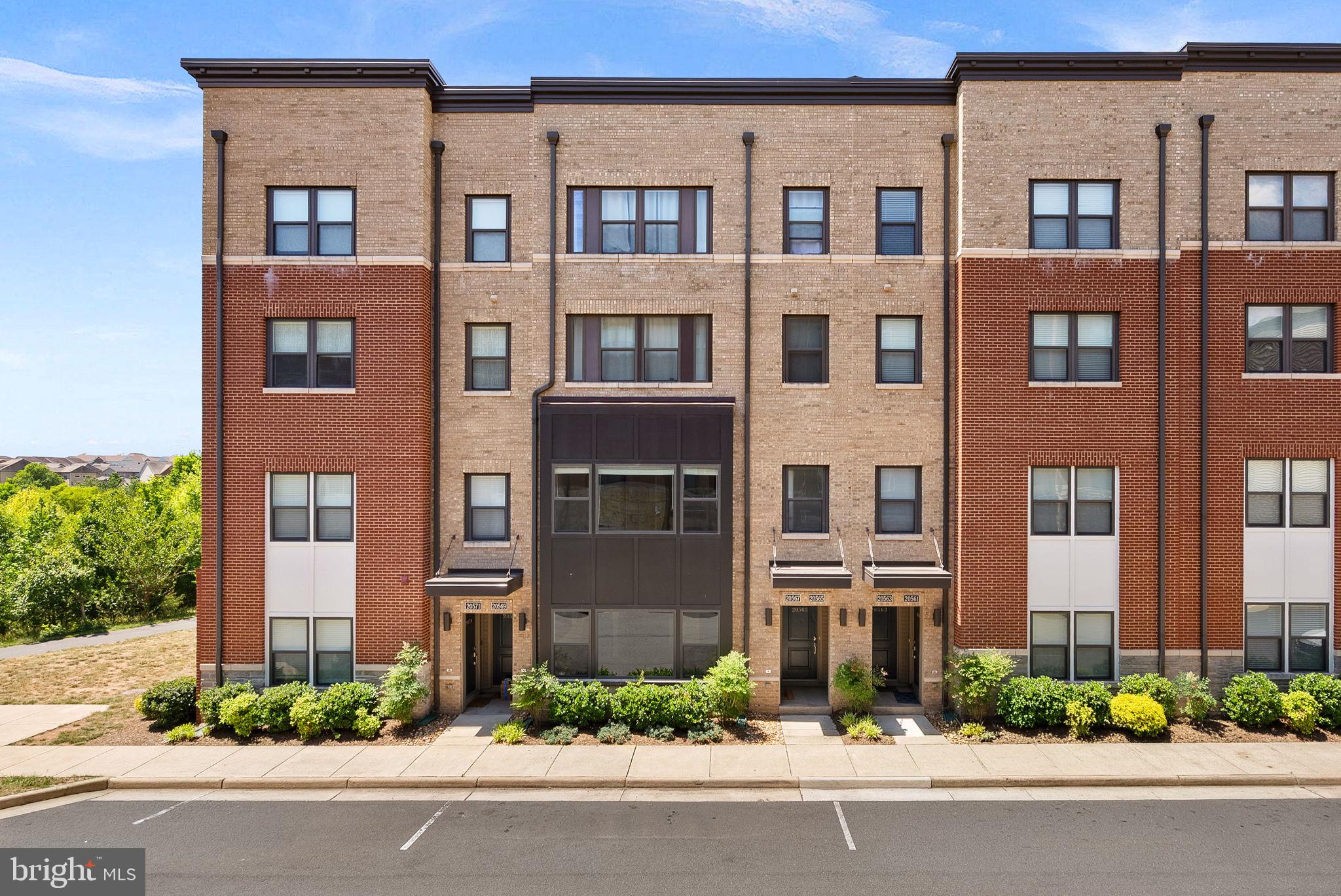 Welcome to this modern two-level townhome style condo in the heart of One Loudoun! Experience one of the rare, truly walkable lifestyles in Loudoun County, with restaurants, cafés, shopping, entertainment, a movie theater, and more just steps from your front door.Step inside to the main level, where you are greeted by an open and spacious living room featuring stunning engineered hardwood floors and fresh paint throughout, giving the home a bright and refreshed feel. Adjacent to the living area is the beautifully updated kitchen, showcasing sleek waterfall quartz countertops with bar seating, a stylish backsplash, stainless steel appliances, a pantry, and modern cabinetry offering ample storage space. The main level also provides direct access to the attached one-car garage and private driveway.Upstairs, you’ll find three bedrooms and two bathrooms, including a spacious primary suite featuring two walk-in closets and a luxurious en-suite bathroom complete with a vanity offering generous counter space, a walk-in shower, and a private water closet. Two additional bedrooms are located on the upper level, including one with direct access to the balcony. The washer and dryer are also conveniently located upstairs. Brand-new carpet throughout the upper level adds a fresh finishing touch.Residents of One Loudoun enjoy access to exceptional amenities through the One Loudoun Club, including an outdoor pool, indoor half basketball court, pickleball courts, tennis courts, scenic trails, outdoor exercise areas, and more.The location is truly unbeatable, within walking distance to Trader Joe's, Alamo Drafthouse Cinema, popular dining options, shopping, cafés, and entertainment. Commuters will appreciate easy access to Route 7, Route 28, the Silver Line Ashburn Metro Station, and Dulles International Airport.This home truly has it all. Schedule your showing today!