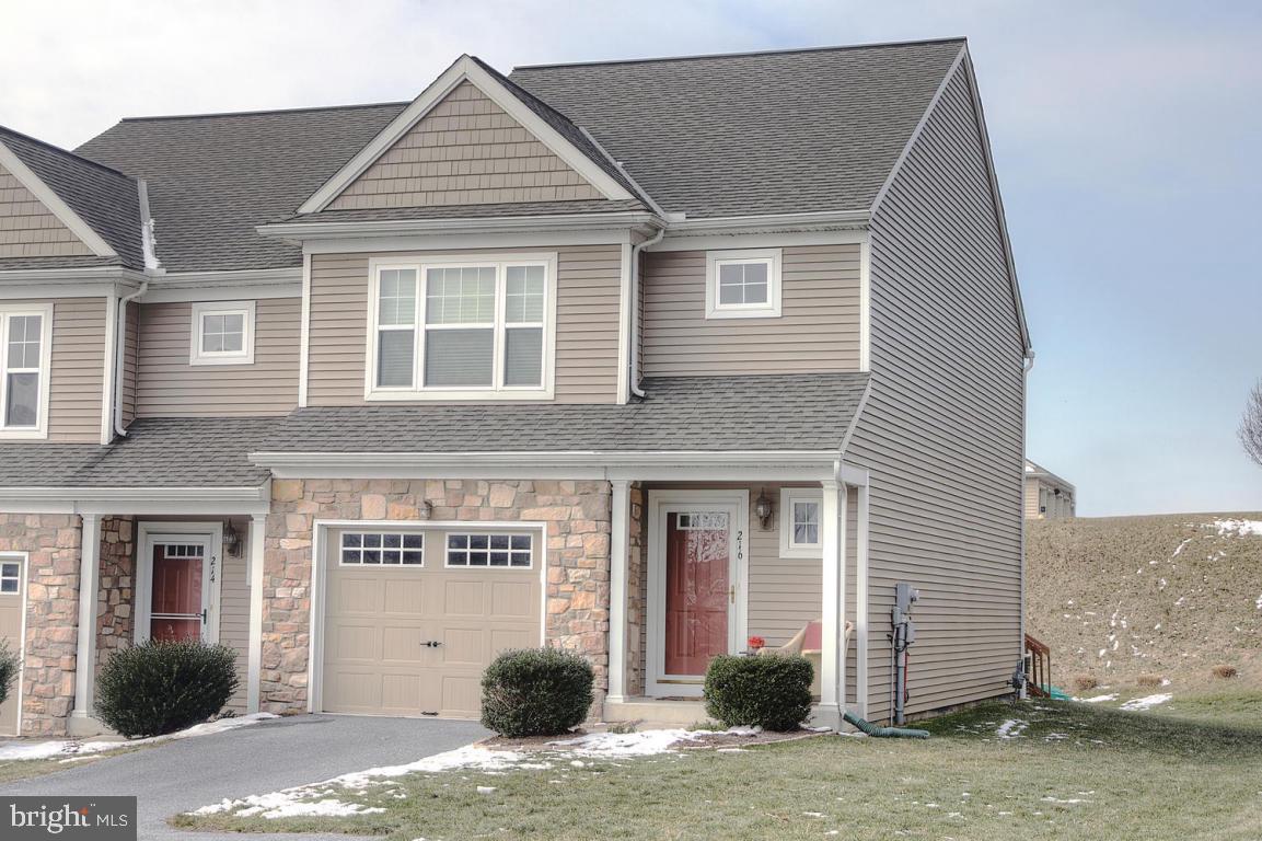 Immaculate move-in ready end unit town home.  Bright and open floor plan. Spacious kitchen with ceramic tile backsplash, gas range, breakfast bar, dining area and living room all open.  Large Master bedroom with a private bathroom and walk-in closet. Convenient 2nd floor laundry room & 2 additional bedrooms & bathroom.  Finished lower level great for entertaining, playroom, or game room.