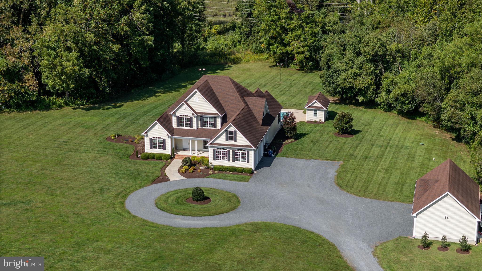 Incredibly rare Cooke’s Hope at Llandaff opportunity featuring nearly 39+/- acres, a 3,800 +/- custom home all 5 minutes of Easton.  As you enter “38 Special Acres” you are greeted with views of the farm and pond and you can see why this property is different from all the others. As the driveway curves around you can see the beautiful Abel built home 3 bay detached garage, and pool house. Upon parking you realize that you can not see another house. As you enter the house the quality of construction is evident with high ceilings, wood floors, and view of the incredible pool area and views of Peachblossom Creek. The open floor plan is comfortable and well suited for entertaining, also offering a cozy den and an office that over look the acreage. The primary suite is stunning with an incredible bath with jetted tub and walk-in shower. The custom closet is enormous with built in drawers and automatic lights. Exploring the first floor even more you will find a gracious laundry room that features the coolest dog washing station that you have ever seen with hot and cold water and tile floors this feature alone sets off the house. The entire house is CAT6 wired with a water filtration system and a whole house reverse osmosis system with holding tanks that hold 150 gallons of treated water. Outside the star of the show is the deck and pool area. The concrete pool and separate hot tub that over look the creek are incredible with a pool house that has a changing area and full bath. There is a 2 car attached garage with a 3 bay detached garage with one bay that is fully insulated for that special car you want to keep out of the weather. There are not many places to hunt this close to Easton but with the pond and 20 acre additional wooded parcel there are waterfowl, deer and turkey opportunities right out your back door. The home also features a first floor and pool generator, and RV plug. There are so many unique things about this property it has to be seen to be believed.