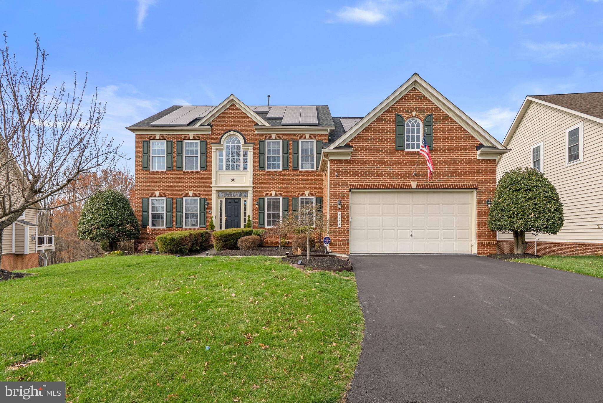 Welcome to this exceptional Villages of Urbana home—an entertainer’s dream offering space, style, and unforgettable amenities. Situated on one of the largest lots in the community, nearly 1/2 acre and backing to trees, this beautifully maintained residence features over 5,000+ square feet, 5 bedrooms, and 4.5 baths designed for both everyday living and upscale entertaining.

The main level impresses with an open-concept layout, highlighted by a gourmet kitchen with granite countertops, stainless steel appliances, and a spacious breakfast bar that flows seamlessly into the sun-filled morning room. Step outside to your private outdoor retreat featuring a covered two-tier deck and brick patio—perfect for relaxing or hosting gatherings.

Upstairs, the expansive owner’s suite offers a luxurious escape with a sitting area and spa-inspired bath, while generously sized secondary bedrooms provide comfort for family and guests.

The fully finished walk-out lower level is truly a showstopper—complete with a custom bar, large recreation area, full bath, additional bedroom, and a dedicated theater room, creating the ultimate at-home entertainment experience.

With dual staircases, a main-level office, fireplace, and thoughtful upgrades throughout, this home blends elegance with functionality in one of Frederick’s most desirable communities.  Mortgage savings may be available for buyers of this listing.