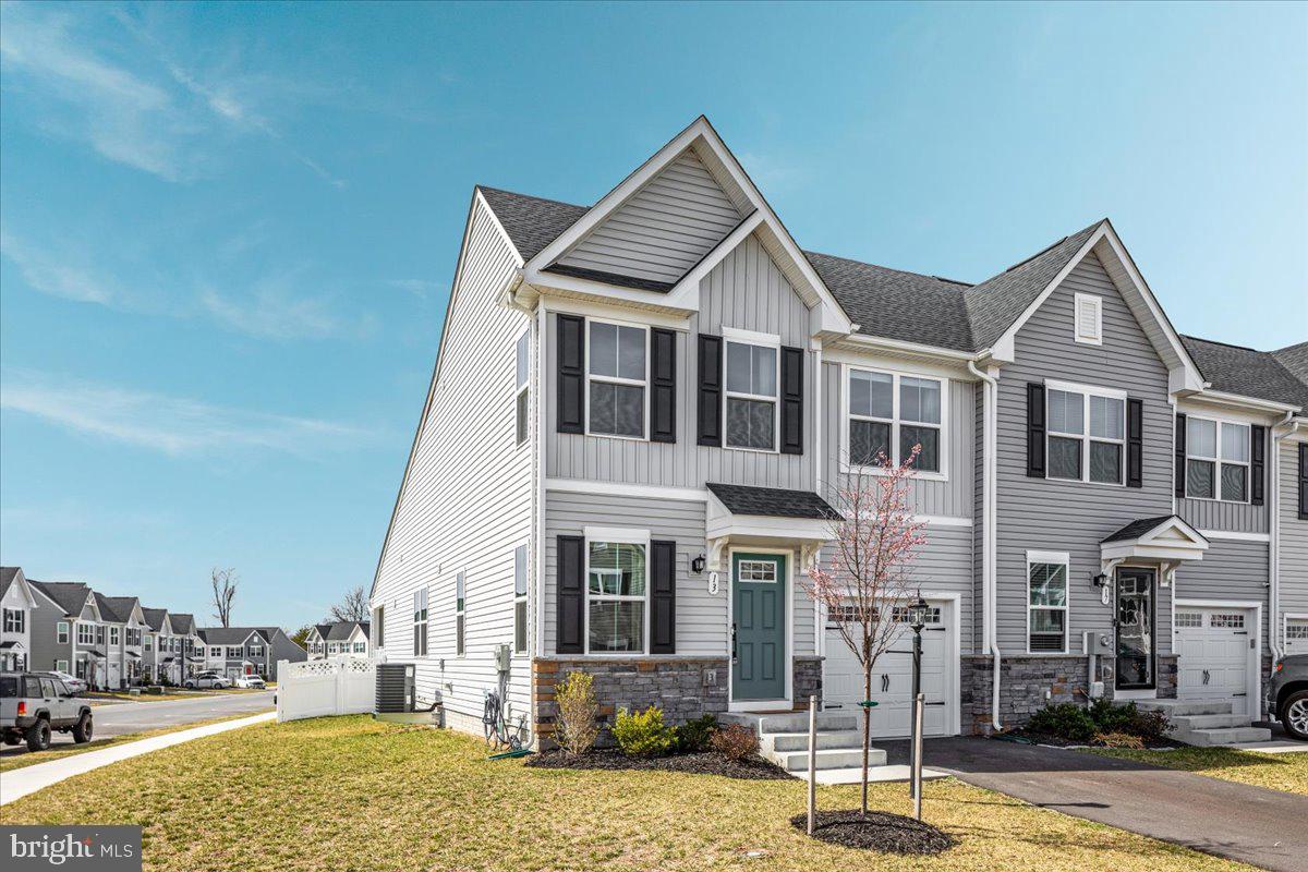 "Beautiful Bibury" This 3 bedroom, 2 1/2 bath end unit townhome has a great layout for everyday living! Spacious kitchen with island, stainless steel appliances and granite countertops! Primary bedroom on the main level with a private bath and walk-in closet! Two additional bedrooms and a shared bath on the upper level. First floor laundry making life much easier. Unfinished basement with plenty of room to add additional square footage if you need it! Basement has full bath rough in, egress window, 2 sump pumps and an active radon system. Fenced in backyard (Vinyl) and covered back porch perfect for sipping your morning coffee or relaxing in the evening. New carpet in living room, all 3 bedrooms/closets and steps going upstairs! You won't want to miss this one!