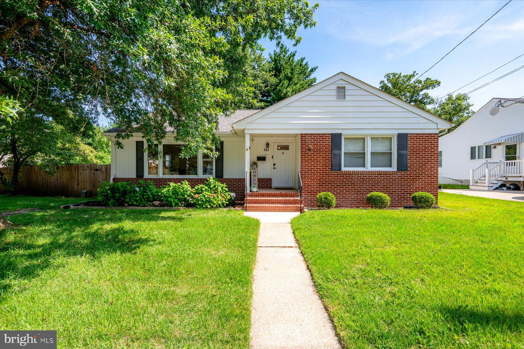 Welcome to 402 Joyce Road, a beautifully maintained brick rancher offering the ease of one-level living with the added flexibility of a full lower level. Thoughtfully cared for and filled with natural light, this home features three spacious bedrooms, a full bathroom on the main level, an additional full bathroom in the lower level, hardwood flooring, and a warm, inviting living room centered around a wood-burning fireplace.
The kitchen flows easily into the main living spaces, while the expansive lower level offers a recreation area, the second full bathroom, abundant storage, workshop space, and flexibility for a variety of uses.
Outside, enjoy a private backyard complete with a fire pit, perfect for relaxing evenings or entertaining family and friends. A newer roof provides added peace of mind, and the convenient location places you just minutes from shopping, restaurants, BWI Airport, Fort Meade, major commuter routes, and everything the Baltimore, Annapolis, and Columbia corridors have to offer.