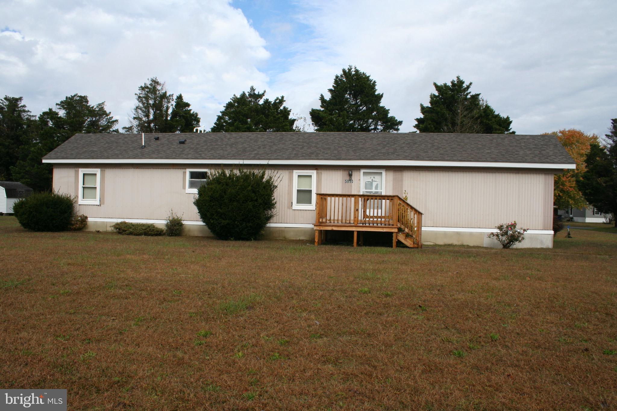 Affordable country living on a corner lot! This single-wide offers 3 bedrooms, 1 full bath, and a spacious living room and an open kitchen—great for everyday comfort. Enjoy outdoor living with a full front deck and a covered, newer Trex deck out back. Plenty of room to spread out, garden, or play, plus a storage shed included for tools and toys. Private, peaceful setting with space to grow—come take a look and get ready to move!