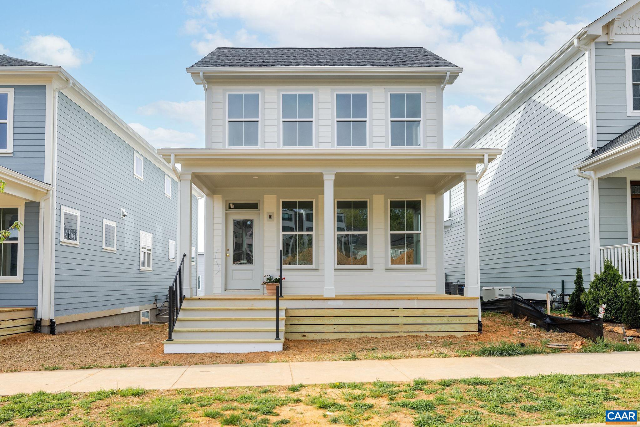 A�Mid-May completion in the sought-after Lochlyn Hill neighborhood in the City, this 3 bedroom/2 bath home offers a rare opportunity to own new construction without the wait. The bright open kitchen/great room layout serves as a gathering place with warm painted perimeter cabinetry, an 8' bayou-stained island, stainless steel appliances and a large walk-in pantry. Custom great room built-ins are flanked by double doors opening directly onto the 20x10 screened porch for al fresco dining. Upstairs, a spacious 13'x18' primary suite + 2 addl oversized bedrooms each with walk-in closets and a shared bath.  The terrace level features a 2-car rear loading garage, expansive laundry room + plenty of storage. Lochlyn Hill offers the rare combination of city convenience and neighborhood charm, with sidewalks, a central park, greenway and trail connections, frontage on Pen Park and Meadowcreek Golf Course, and a location just 2.2 miles from the Historic Downtown Mall.,Granite Counter,Painted Cabinets,Wood Cabinets