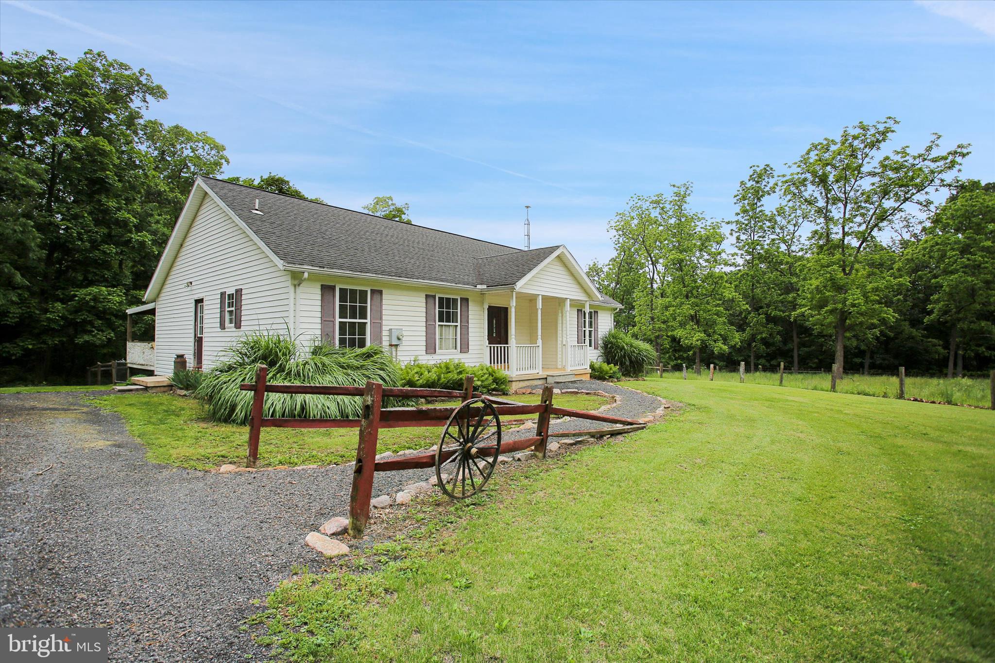 Set on nearly 20 beautiful acres, this charming property offers the perfect blend of comfort, functionality, and country living. The home features an inviting open floor plan with 2 bedrooms, including a spacious primary suite complete with its own private full bath. A second full bathroom with a walk-in shower adds convenience for guests and everyday living.
The cozy wood stove efficiently warms the entire home, creating a warm and welcoming atmosphere throughout the seasons. Downstairs, the full basement provides endless possibilities for additional living space, storage, a workshop, or future finishing opportunities.
Step outside to enjoy the fenced backyard, ideal for pets, gardening, or relaxing outdoor gatherings. Equestrian and hobby farm enthusiasts will appreciate the well-equipped barn featuring 2 stalls, electric service, hay loft, and attached chicken run. The property also includes approximately 1 acre of pasture, perfect for animals or small-scale farming. A small stream meanders through the property, adding to the peaceful setting and natural beauty.
Outdoor enthusiasts will love the excellent hunting opportunities this property provides, with nearly 20 acres offering privacy, wooded areas, and abundant space to enjoy wildlife right in your own backyard.
A detached 2-bay garage with automatic openers offers ample space for vehicles, equipment, and hobbies. With nearly 20 acres of open space and privacy, this unique property delivers the peaceful rural lifestyle you’ve been searching for while still offering plenty of room to grow and make it your own.