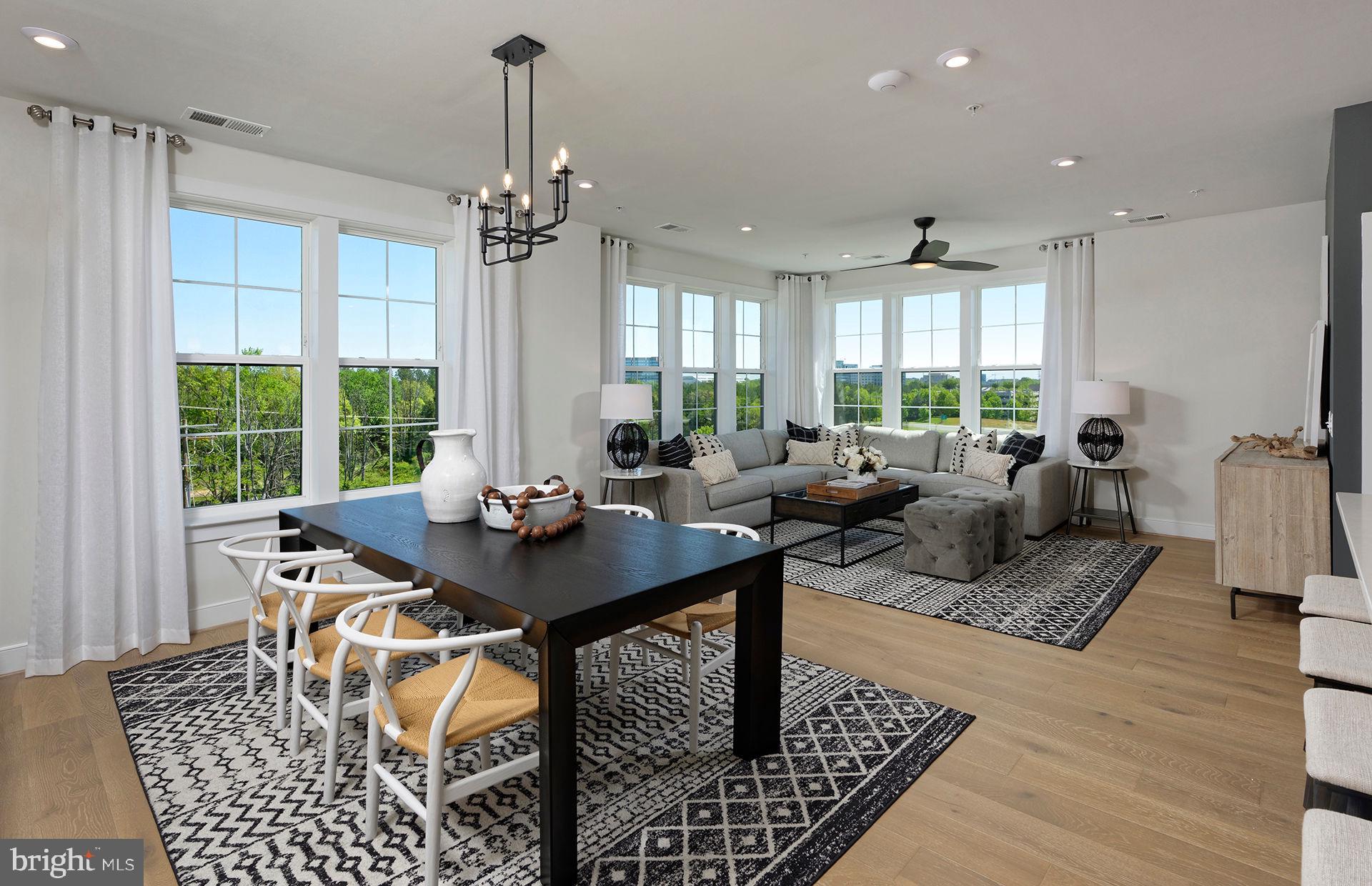 As the largest condo in the building, the Everett's long entryway leads into the ideal downsizer's home. Check out the pocket den.
