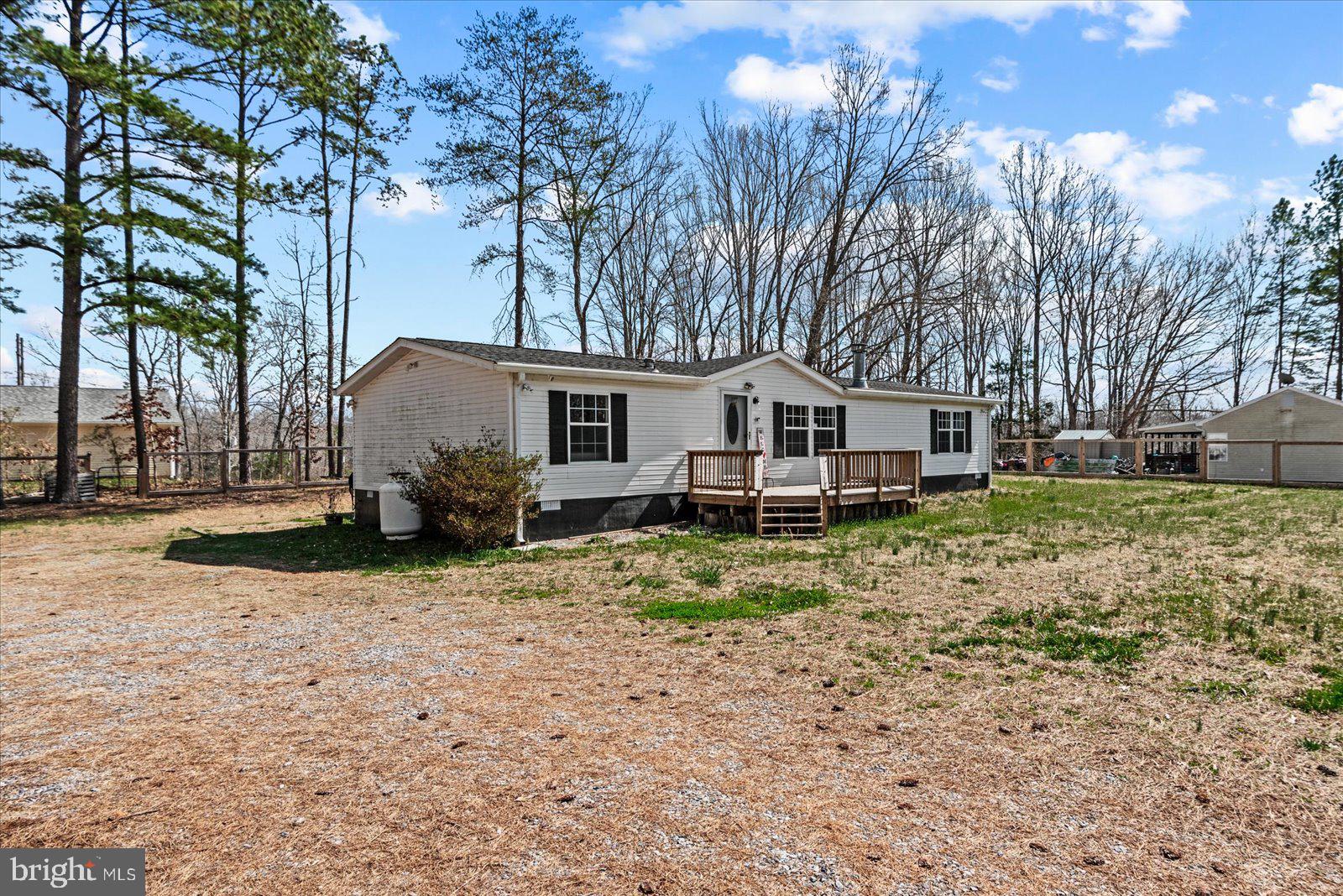 Welcome to this charming 3-bedroom, 2-bath ranch-style home located at 26271 Dogwood Dr in Ruther Glen, offering comfortable one-level living in a peaceful residential setting.
This well-maintained home features new flooring throughout the main living areas and a beautifully renovated kitchen with quartz countertops, creating a fresh and modern space perfect for everyday living and entertaining. The home also includes a versatile office/den, ideal for working from home, a study area, or a flexible room to suit your lifestyle needs.
Recent improvements add even more value, including a new heat pump for efficient heating and cooling and a new septic system installed in 2022, giving buyers peace of mind for years to come.
Step outside to enjoy the fully fenced yard, perfect for pets, outdoor gatherings, gardening, or simply relaxing with added privacy. The property also features a double shed with a workshop, providing excellent space for storage, hobbies, or projects. A 2-car carport offers convenient covered parking and additional storage.
With its thoughtful updates, functional layout, and generous outdoor space, this home offers a wonderful opportunity for comfortable living while still being conveniently located near major routes, shopping, and everyday amenities.
A fantastic opportunity to own a well-cared-for ranch home in the heart of Ruther Glen.