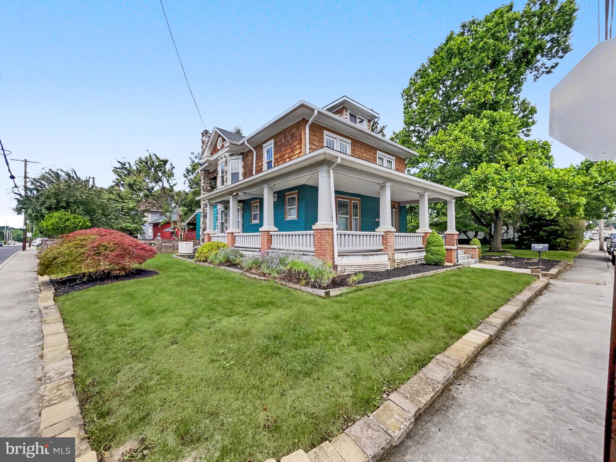 Step into timeless charm with this stunning 1930s Victorian home, perfectly situated on a coveted double corner lot. Boasting 3,200 square feet, this 4 bedroom, 2 bath home seamlessly blends historic elegance with modern comforts. Updates in recent years include a new roof (2019), energy-efficient windows (most replaced 2019-2024), and a stylish new kitchen with farm sink, butcher block tops, and stainless appliances. Cozy up by the pellet stove insert (2025) in the LR, the woodburning stove in the kitchen/breakfast room, or enjoy comfort year-round with two newer, high efficiency heating systems with central air. Outside, a covered rear porch, fenced yard, and a two-car detached garage complement the rear yard and barn. Off-street parking, whole house generator (2025), this gem is ready to be your dream home. Don’t miss this rare find—schedule your private tour today!