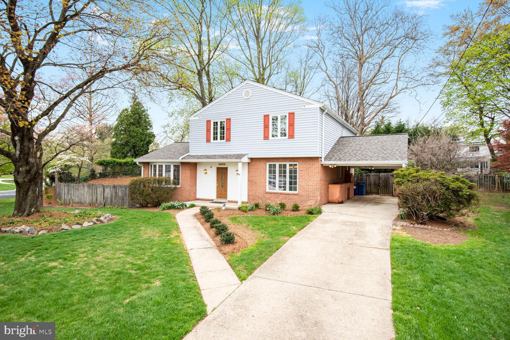 This spacious split-level offers a perfect blend of classic elegance and modern comfort. Nestled on a spacious 0.27-acre lot with fenced backyard, this well-maintained brick and siding home boasts three finished levels of inviting living space, ideal for both relaxation and entertaining. Step inside to discover a warm and welcoming interior featuring beautiful refinished hardwood floors. Enjoy cozy evenings by the wood-burning fireplace in the family room or primary bedroom or unwind in the jetted tub of the remodeled hall bathroom. With four generous-sized bedrooms and four remodeled bathrooms, including two full and two half baths, there’s plenty of room for everyone. Additional features include two fireplaces with mantels, recessed lighting, four ceiling fans, cathedral ceiling with skylight in living room, and upgraded double-pane windows that enhance energy efficiency. The finished basement is the perfect place to watch the big game and hang out with your friends at the custom built wet bar. The living space extends outdoors with a lovely patio, perfect for summer barbecues or peaceful mornings with a cup of coffee. The attached carport and concrete driveway provide convenient parking options. The property is conveniently located within approximately one mile of the Glenmont Metro Station, is less than one mile to the 11-acre Glenfield Park featuring large playground, picnic shelter, soccer field, tennis courts, and exercise station; and is within minutes of the Matthew Henson Trail, the Layhill Road exit for the ICC Highway, shopping, restaurants, schools, golf courses, and places of worship. We hope you enjoy your visit to this fantastic property!