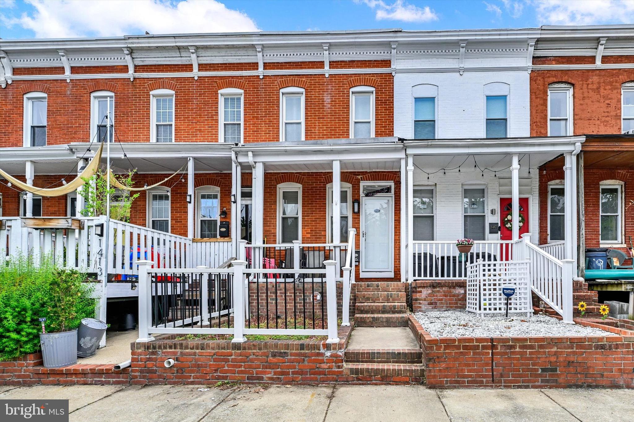 Live in the Heart of It All in the neighborhood of South Baltimore. Walk everywhere and take your pups! Wake up to stadium views and walk to the game. This updated Federal Hill rowhome puts you steps from M&T Bank Stadium and Camden Yards, with Hanover Street right around the corner right for an easy morning commute.  Three finished levels, off-street parking, and a layout built for the way people actually live.  This one checks boxes that are genuinely hard to find at this price point in Fed Hill. The main level sets the tone with hardwood floors, exposed brick, and an easy flowing floor plan. The kitchen delivers granite counters, stainless appliances, and soft-close cabinetry, functional, clean, and ready for Sunday brunch or a quick weeknight dinner before the game. A half bath and mudroom round out the level. Upstairs, the primary suite is your retreat after a long night on Cross Street, complete with access to a rear deck for morning coffee or late-night unwinding. A second bedroom and full hall bath give you flexibility for a roommate, guests, or a home office setup. The lower level is where this home really earns its keep. Two bonus rooms, use them as bedrooms, a gym, a studio, whatever the city life demands, plus a third full bath with a spa-style shower to relax in style. A rear parking pad means you're never circling the block after Ravens or Orioles traffic clears. Multiple outdoor spaces, including the front porch and rear 2nd story deck deck, let you take in the skyline on your own terms. The best Federal Hill has to offer is easily within reach.  Property is a short sale and sold strictly as-is and may include contents at closing. Short sale will be professionally negotiated by an experienced short sale team.