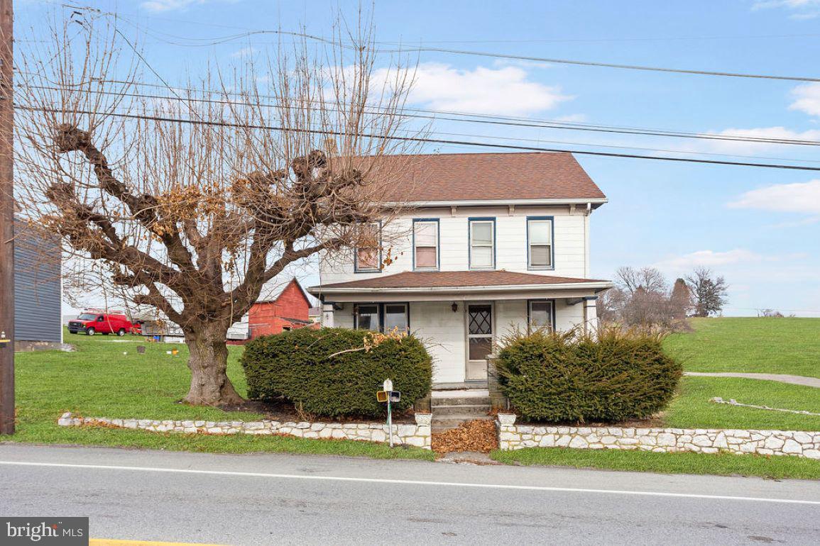 Fantastic 2 story colonial with 2 separate buildings out back for hobby space or possible business (check zoning).  Big kitchen has lots of countertop work space and a big 1st floor laundry area sits off of the kitchen.   Formal dining room.  Upstairs, there are 3 bedrooms and a full bath.  Lots of off street parking too!  Being sold AS IS.