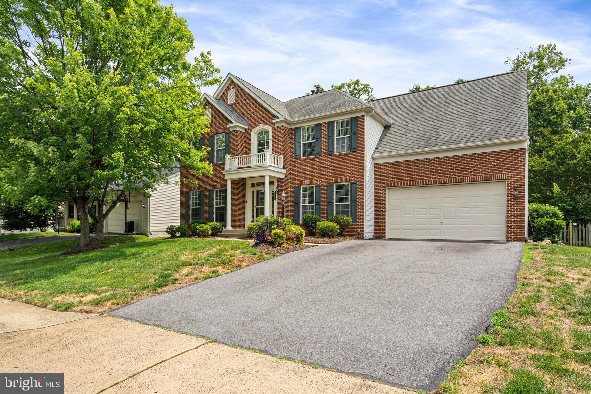 Welcome to One of Braemar's Most Inviting Homes
Perfectly positioned on a beautiful fenced lot in the highly desirable Braemar community, this brick-front colonial offers nearly **3700+ finished square feet** of thoughtfully designed living space, combining comfort, functionality, and room to grow.
From the moment you arrive, you'll appreciate the timeless curb appeal, welcoming front elevation, and attached two-car garage. Step inside to discover warm wood flooring throughout the main level and a floor plan designed for both everyday living and effortless entertaining.
The heart of the home is the beautifully appointed kitchen featuring crisp white cabinetry, granite countertops, stainless steel appliances, a center island, and abundant workspace for preparing meals and gathering with family and friends. The open design creates the perfect setting for everything from busy mornings to holiday celebrations.
Upstairs, you'll find **four spacious bedrooms** and **two full baths**, including a generous primary suite designed as a peaceful retreat. Every bedroom offers comfortable proportions, providing flexibility for family, guests, home offices, or hobbies.
The fully finished lower level expands your living space even further, featuring a full bath and a versatile bonus room that can easily serve as a **fifth bedroom**, guest suite, fitness area, media room, or private workspace.
Fresh neutral paint and carpeting create a move-in ready feel, while major updates, including a **roof replacement in 2015**, provide added peace of mind.
Outside, enjoy a fully fenced rear yard offering plenty of space for outdoor entertaining, gardening, pets, or simply relaxing after a long day.

Living in Braemar means more than owning a beautiful home—it's a lifestyle. Residents enjoy access to **two community pools, a clubhouse, scenic walking and biking trails, playgrounds, and an abundance of community amenities** that make this one of Prince William County's most sought-after neighborhoods.

This is the kind of home buyers wait for—generous space, timeless updates, exceptional community amenities, and a location that keeps you close to schools, shopping, dining, and commuter routes.

**4 Bedrooms | 3.5 Baths | Possible 5th Bedroom | Nearly 3,900 Finished Sq. Ft. | Brick Front | 2-Car Garage | Finished Basement | Fenced Yard | Roof Replaced 2015 | Braemar Amenities**

**A home designed for living well today and creating memories for years to come.**