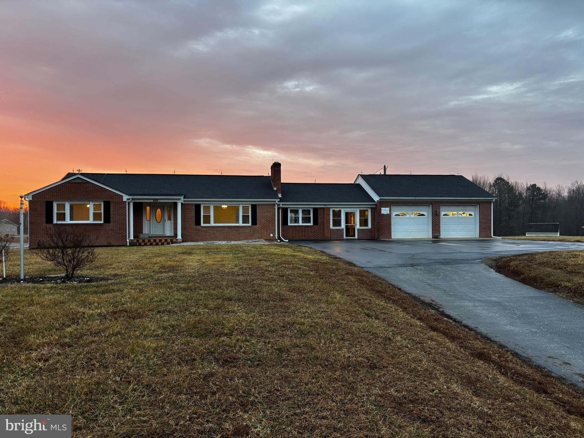 This beautiful home is back on the market!!  The buyer's funding fell through so now's your chance to make this house your home!  Beautiful Brick rambler on 1 acre in the sought after area of 7th District.  This home has been meticulously cared for and features original hardwood floors that have been restored to their original beauty.  The home has 3 bedrooms, two bathrooms, living room, family room, kitchen and dining room combination, a wonderful all season porch, a huge two car garage with a half bath, a covered deck, a partially finished basement with a second kitchen, laundry room, full bath, recreation rooms, office, and a lot of storage room!  Two detached garages for your hobbies or storage needs.  This is a wonderful home for entertaining and living your best life!