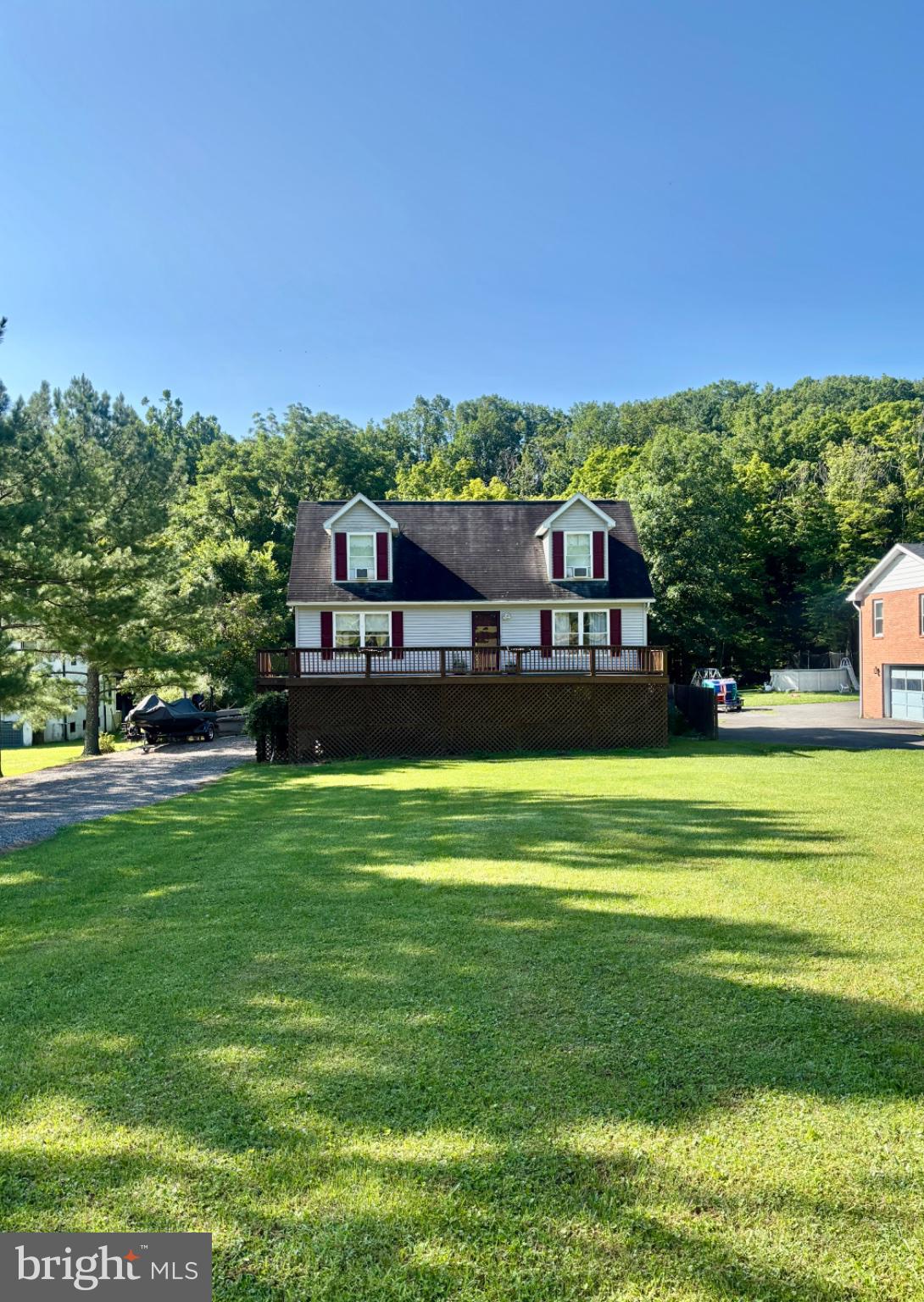 Tucked against the woods, this charming 3-bedroom, 1-bath Cape Cod nestled on a large, level lot on Gramlich Road is completely move-in ready and priced to sell. This charming home offers the perfect blend of privacy and convenience, just minutes from shopping, dining, and everyday amenities. 

Inside, you'll find a cozy eat-in kitchen, a convenient main-level bedroom, a full bath, and a comfortable layout that's perfect for first-time buyers, those looking to downsize, or anyone seeking peaceful living. The full walkout basement provides plenty of storage or the opportunity for additional living space. 

Enjoy your morning coffee on the front deck or unwind on the rear deck while taking in the quiet, wooded backdrop. As an added bonus, it is soon to have a brand new roof!

If you've been searching for a home that's cozy, move-in ready, and offers a quiet setting without sacrificing convenience, this one is a must-see! Photos will be uploaded 7/24.