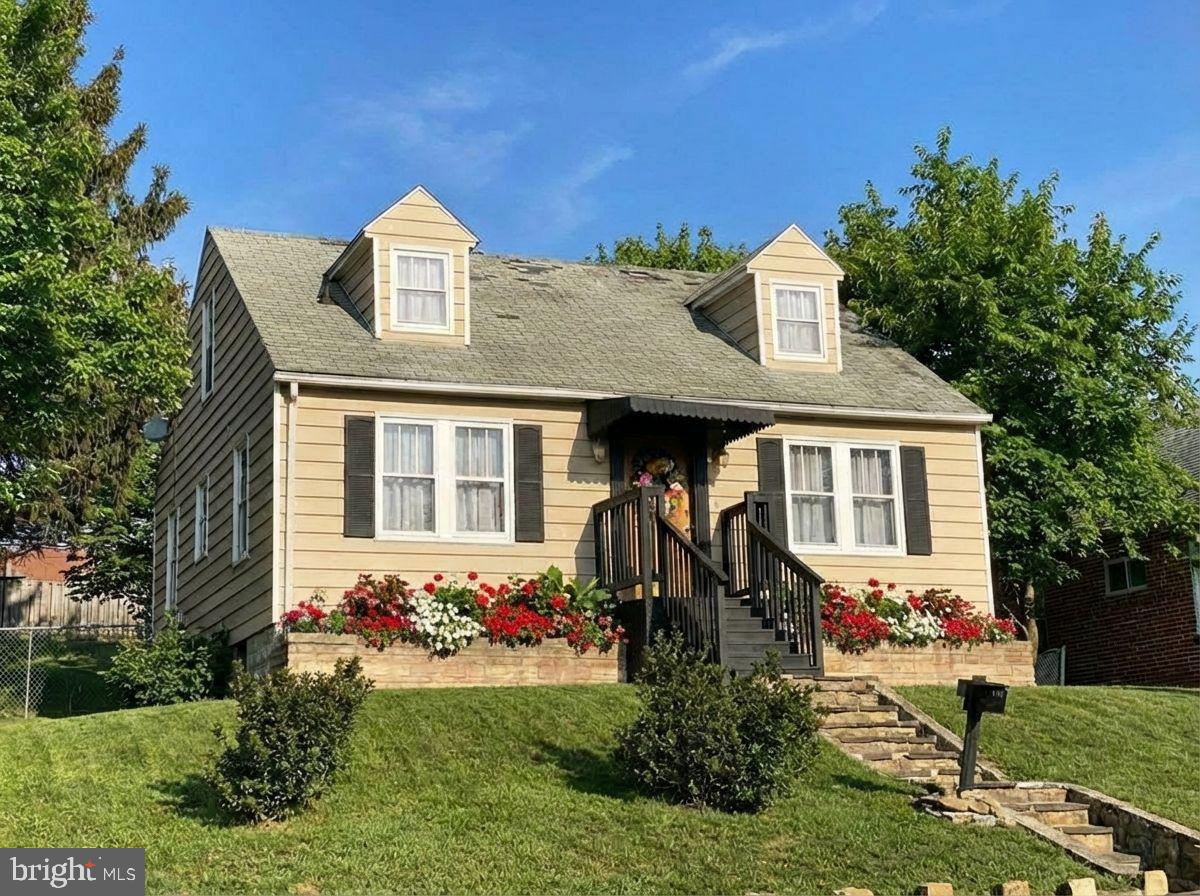 Welcome to this charming cape cod home, situated on a double lot, in the picturesque mountains of Western Maryland.  This home is located in close proximity to both middle and high schools. This remodeled residence features three cozy bedrooms and one beautifully updated bathroom, with a fenced-in back yard and off-street parking.  As you step inside, you'll find a quaint kitchen that boasts a large center island and pass-through, allowing seamless service to the adjacent living room - making this space ideal for entertaining. The exposed brick flue between the kitchen and dining room adds unique character to the rooms, and is complemented by decorative wood planks adorning the back wall and ceiling. The gleaming hardwood floors throughout the home create warmth, while the faux painting on the second floor adds a touch of charm.  The updated bathroom on the main floor features a luxurious walk-in ceramic tile shower, with a built-in seat for convenience. Step out onto the back porch and you will find an inviting spot to relax on the swing, enjoying peaceful summer evenings. Take notice of the various intricate wall hangings throughout the home, that were made from original pieces of this house. You won't want to miss this delightful home. Call Today to Schedule a Tour!!!

*** Some images are AI-generated/virtually staged for illustration purposes only. Please tour the property in person to verify actual condition.