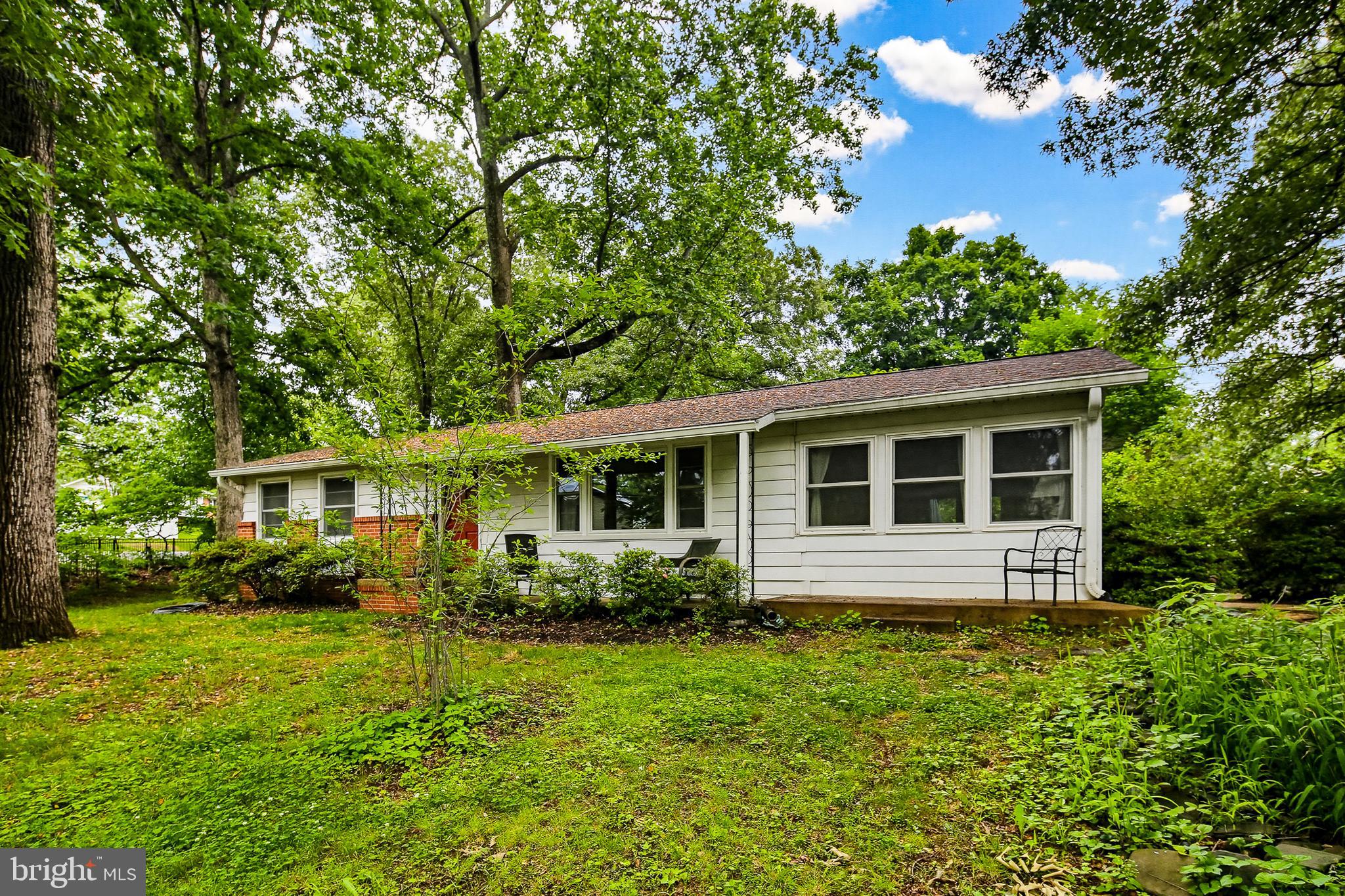 Welcome to this charming 3-bedroom, 2-bath rancher located on a private, tree-lined corner lot in the highly desirable Cape St. Claire community. Lovingly maintained and thoughtfully updated, this home is ready for its next owner.

The kitchen features stainless steel appliances, updated countertops, and a cozy breakfast area. A spacious living room offers flexible use as a combined living and dining space. The primary bedroom includes a private bath with a walk-in shower, while the large second bedroom provides plenty of comfort and versatility.

Hardwood floors add warmth and character throughout much of the home. The sunroom serves as part family room and part third bedroom, creating additional flexible living space filled with natural light. An unfinished basement offers endless possibilities for storage, a workshop, home gym, or future finished space.

Outside, enjoy a beautifully landscaped yard surrounded by mature trees, colorful flowers, and a high aluminum perimeter fence. A generous parking area adds convenience.

Major updates over the past 12 years include:

New roof
Replacement windows
Two split-system heating and air conditioning units
Aluminum perimeter fencing
Kitchen appliances and countertops
And more

Residents of Cape St. Claire enjoy outstanding community amenities including beach access, bike paths, parks, and more. The area is also known for its highly regarded schools and welcoming neighborhood atmosphere.

Come experience this wonderful home, beautiful yard, and vibrant community for yourself!