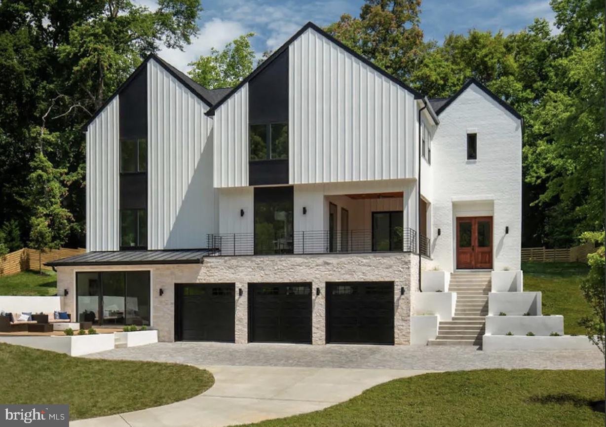 This breathtaking and award winning modern home has been carefully designed to enhance the natural beauty of its amazing .5 acre property in sought-after Chesterbrook Woods. This spectacular 6 BR, 6 BA home offers everything your client has been looking for and more, including 3 CAR GARAGE, ELEVATOR, multiple indoor and outdoor entertainment areas, a  HEATED POOL with automatic cover, floor-to-ceiling windows throughout, and SOLAR PANELS with 2 Tesla battery packs. The gourmet kitchen includes quartz countertops and expansive waterfall-style island with seating, high-end stainless-steel appliances, custom cabinetry and modern concept pantry. The stunning two-story great room features a 20 ft ceiling with exposed upper level library, floor-to-ceiling windows providing extraordinary natural lighting and an impressive view of the backyard and expansive patio. A stylish double-sided gas fireplace separates the luxurious great room from the formal living room. The open-concept formal dining room is surrounded by floor-to-ceiling glass windows, a large covered balcony and an outdoor viewing deck. An office space/bedroom with a full bath completes the spacious main level. The principal bedroom retreat encapsulates luxury with its modern finishes, two walk-in closets, elegant bathroom, private balcony and gas fireplace. Three generous secondary bedrooms with en-suite bathrooms and modern highlights. The basement includes, a guest bedroom with full bath, recreation room, fitness room, theatre room, and one-of-a-kind wet bar/wine room/lounge which walks out to a private front deck oasis with built-in gas fire pit. Hardwood flooring, high ceilings, custom modern lighting/finishes and professional landscaping throughout. Conveniently located near McLean parks, shops and restaurants, as well as commuter routes.