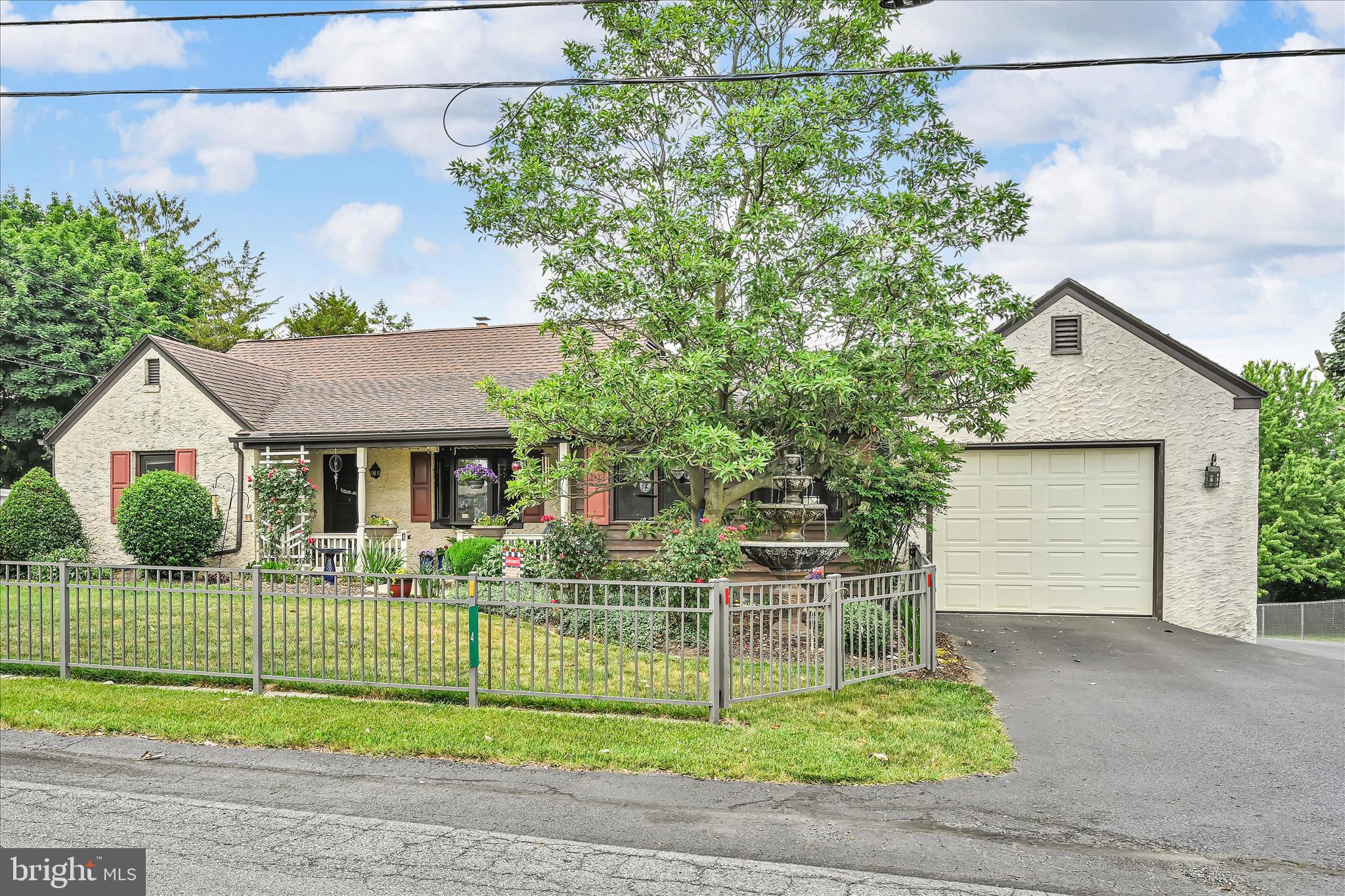 Beautifully Updated Ranch Home in Conestoga Valley School District, West Earl Township with an Akron Address.
Welcome home to this meticulously maintained one-story rancher offering comfort, functionality, and exceptional outdoor living in the desirable Conestoga Valley School District of Lancaster County.
This spacious home features 3 bedrooms and 2.5 bathrooms, along with numerous updates completed over the years. The inviting kitchen showcases unique cement countertops, and all appliances are included, making this home truly move-in ready.
Enjoy the warmth and efficiency of propane radiant floor heating, complemented by a newly installed central air conditioning system (2025) and all-new flooring throughout. The generous first-floor living room provides plenty of space for entertaining or relaxing, while the versatile rear sunroom can serve as a bright sitting area, home office, or additional bedroom.
The finished lower level expands your living space with a large family room, dedicated office area, and workshop space—perfect for hobbies, projects, or working from home.
Outdoor Features You'll Love:
Expansive Trex deck with roof, only 3 years old
Large patio area featuring the "Cadillac" of hot tubs
Fully fenced backyard
Beautiful landscaping and established flower beds
Two storage sheds
Private driveway extending to the rear of the property
For car enthusiasts, hobbyists, or anyone needing extra storage, the property includes two one-car garages, with one garage offering an additional large workshop area that provides room for extra vehicles, equipment, or projects.  A Carport for that extra covered space.   And an attached 1 car garage.
Conveniently located with quick access to major highways, shopping, dining, and surrounding towns, this property combines peaceful living with everyday convenience.