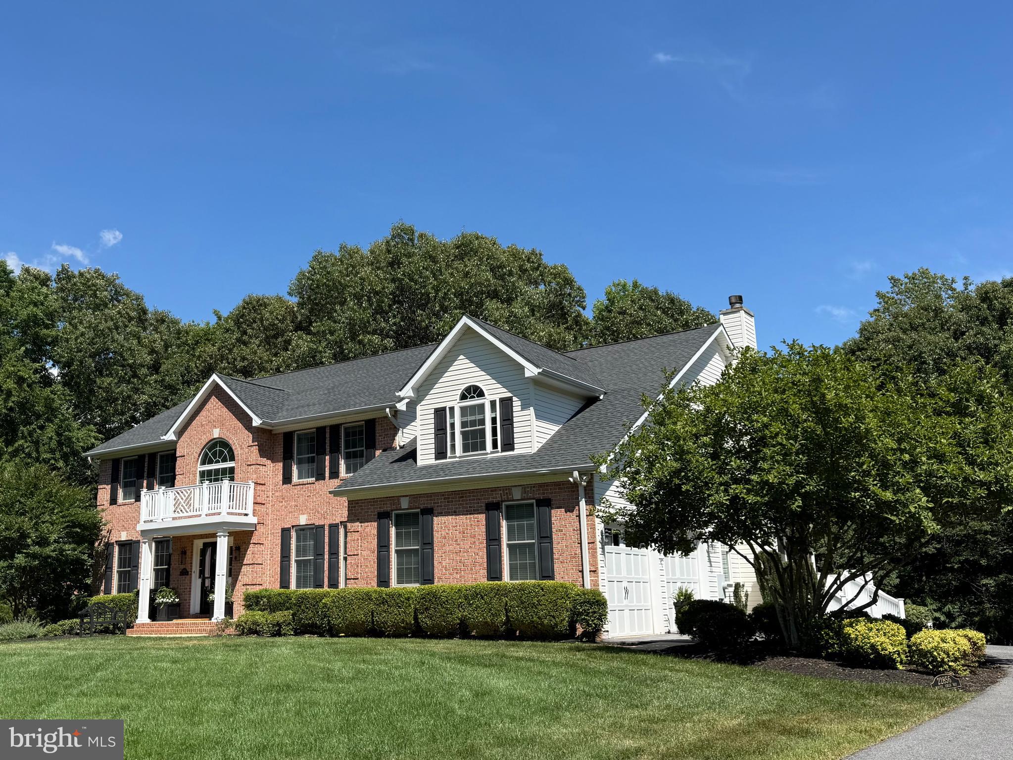 This stunning 5 bedroom home sits gracefully at the end of a cul-de-sac on a private lane in Avenmar; a water oriented community on Breton Bay. Its elegant facade overlooks the lovely landscaped yard. From the gourmet kitchen, wander on to the custom covered rear screened porch where the morning sun dances across the private backyard and patio. Each spacious bedroom is filled with natural light and overlooks the lush woodland and peaceful yard. The main level welcomes you with gleaming hardwood floors that stretch throughout. Formal living and dining areas are perfect for entertaining plus a dedicated office for quiet work-time. The family room off of the kitchen features a cozy wood burning fireplace as the centerpiece while the gourmet kitchen impresses with its high-end appliances, quartz counters and spacious pantry. The walk-out basement offers a fantastic space for movie night, family fun and projects while ample storage keeps everything organized and out of sight.  This home promises to delight the most discriminating buyer.
