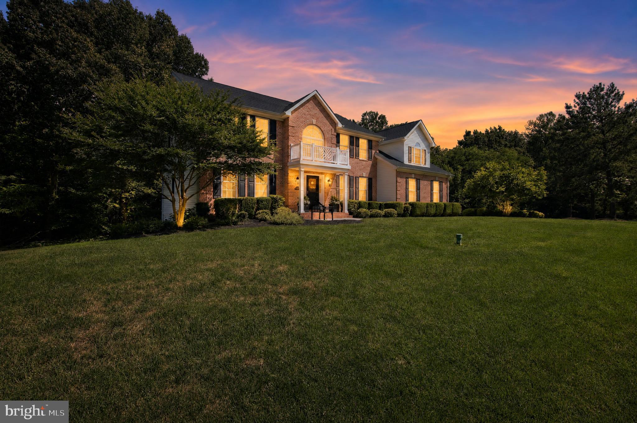 This stunning 5 bedroom home sits gracefully at the end of a cul-de-sac on a private lane in Avenmar; a water oriented community on Breton Bay. Its elegant facade overlooks the lovely landscaped yard. From the gourmet kitchen, wander on to the custom covered rear screened porch where the morning sun dances across the private backyard and patio. Each spacious bedroom is filled with natural light and overlooks the lush woodland and peaceful yard. The main level welcomes you with gleaming hardwood floors that stretch throughout. Formal living and dining areas are perfect for entertaining plus a dedicated office for quiet work-time. The family room off of the kitchen features a cozy wood burning fireplace as the centerpiece while the gourmet kitchen impresses with its high-end appliances, quartz counters and spacious pantry. The walk-out basement offers a fantastic space for movie night, family fun and projects while ample storage keeps everything organized and out of sight.  This home promises to delight the most discriminating buyer.