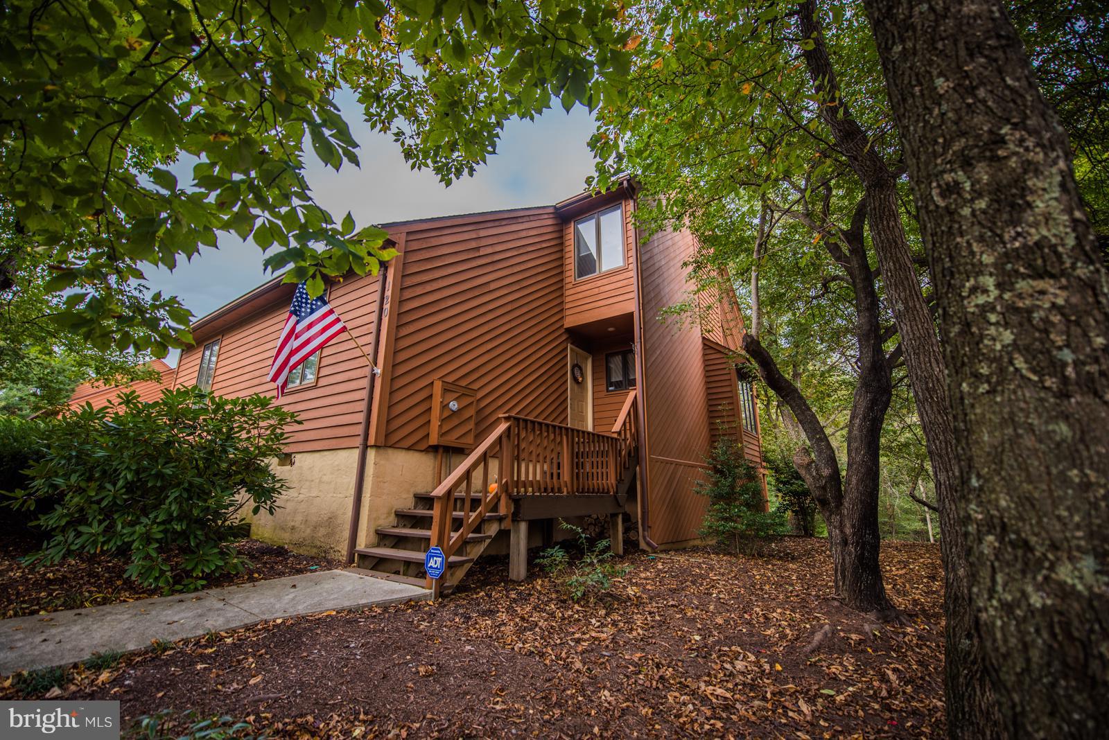 This well maintained End Unit is close to outdoor pool & Clubhouse Grille and located on the Fairways on the Stoney Lick Golf Course!  1st and 2nd level decks. Vaulted ceilings in master and jetted tub. Indoor-Outdoor membership available with initiation fee. Cluster Assoc. fee takes care of most ext. maintenance. Storage shed on lwr deck plus lots of closet storage space. Bedroom level laundry.