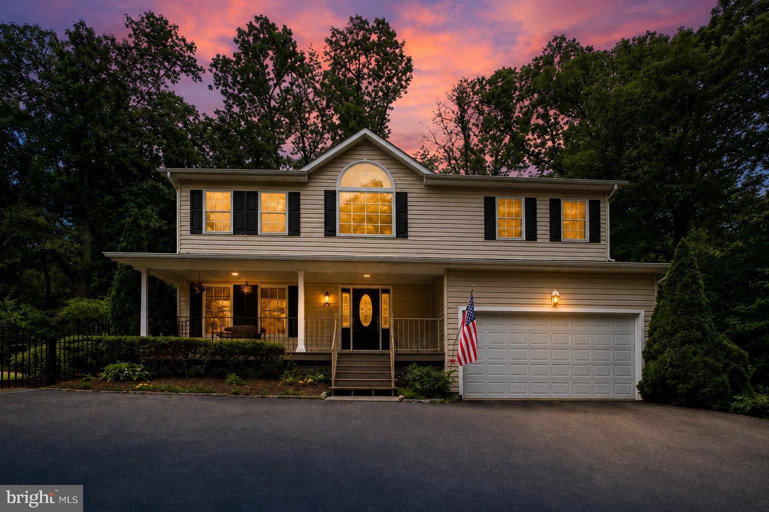Welcome to your very own hilltop hideaway in the sought-after Herald Harbor community of Crownsville. Nestled on nearly half an acre, surrounded by mature trees makes this beautifully maintained Colonial the perfect blend of privacy, comfort, and convenience.

Custom Built in 2008, features 4 bedrooms, 3 full baths, 1 half bath, and over 3,200 square feet of living space across three levels. The inviting two-story foyer showcases gleaming hardwood floors and natural light throughout the main level. The family room, anchored by a cozy gas fireplace, located conveniently to the gourmet kitchen featuring a Greenhouse Window to grow your herbs / plants within hands reach, beautifully stained wood cabinetry, granite countertops, stainless steel appliances, pantry storage, and breakfast area make this main gathering point for all occasions.  

Upstairs features New Upgraded Carpet (2025), the primary suite offers a spa-like bathroom with a jetted soaking tub, corner glass shower, double vanity, and a large walk-in closet. Three additional bedrooms, a full bath, completing the second floor is the convenient upper-level laundry.

The finished walk-out lower level with new carpet just installed, provides exceptional flexibility with a full bath, recreation space, private exterior access, and potential for a multigenerational living arrangement, fifth bedroom, home office, gym, or a guest suite.

Outdoor living is equally impressive with a welcoming front porch, fenced yard area, 2 tier double decks overlooking the peaceful, wooded backyard creating a true backyard sanctuary every nature lover will enjoy. Additional highlights include Leaf Filter gutter system, Dual HVAC Systems a large oversized 2-car attached garage with a new opener installed in 2025.  Driveway offers ample parking.   New Water Heater just installed 2026

Enjoy a charming neighborhood atmosphere featuring a local Convenience Store / Restaurant, nearby water access, local dining, parks and marinas. Commuters will appreciate the convenient location near Annapolis, BWI Airport, Fort Meade, NSA, and commuter routes.

Experience the perfect balance of nature, privacy, and modern living.