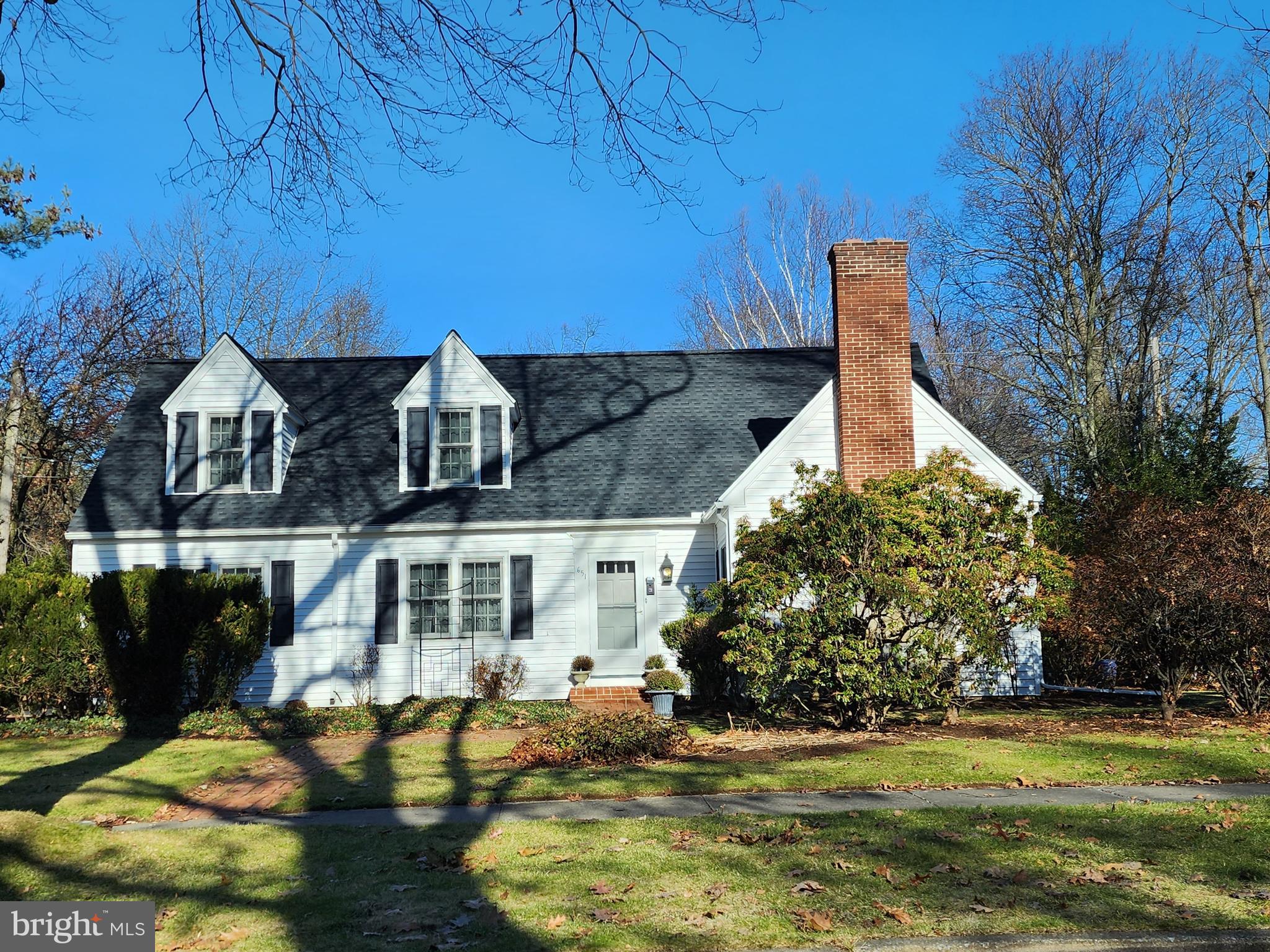 Lovely dwelling, beautifully located on a stunning corner lot in treasured West College Heights neighborhood. Step inside, notice hardwood floors, French doors, built-ins, and unending charm that fills this adored home. Discover a sweet and spacious kitchen with cozy eat-in area ideal for morning coffee. The dining room is perfect for relaxing over meals and making memorable celebrations with family and friends. An electric fireplace graces the generous living room, providing ambiance and comfort while winding down or entertaining guests. Discover a delightful office, filled with natural light and views to the outdoors, making it an ideal location for concentration. Completing the main floor is a nicely sized family room and a convenient half bath. Ascend to the upper level and find three bedrooms, one is serving as an office, and a full bath. One-car garage, new roof; PSU campus, downtown, shopping, restaurants, golf course and bike path just blocks away.