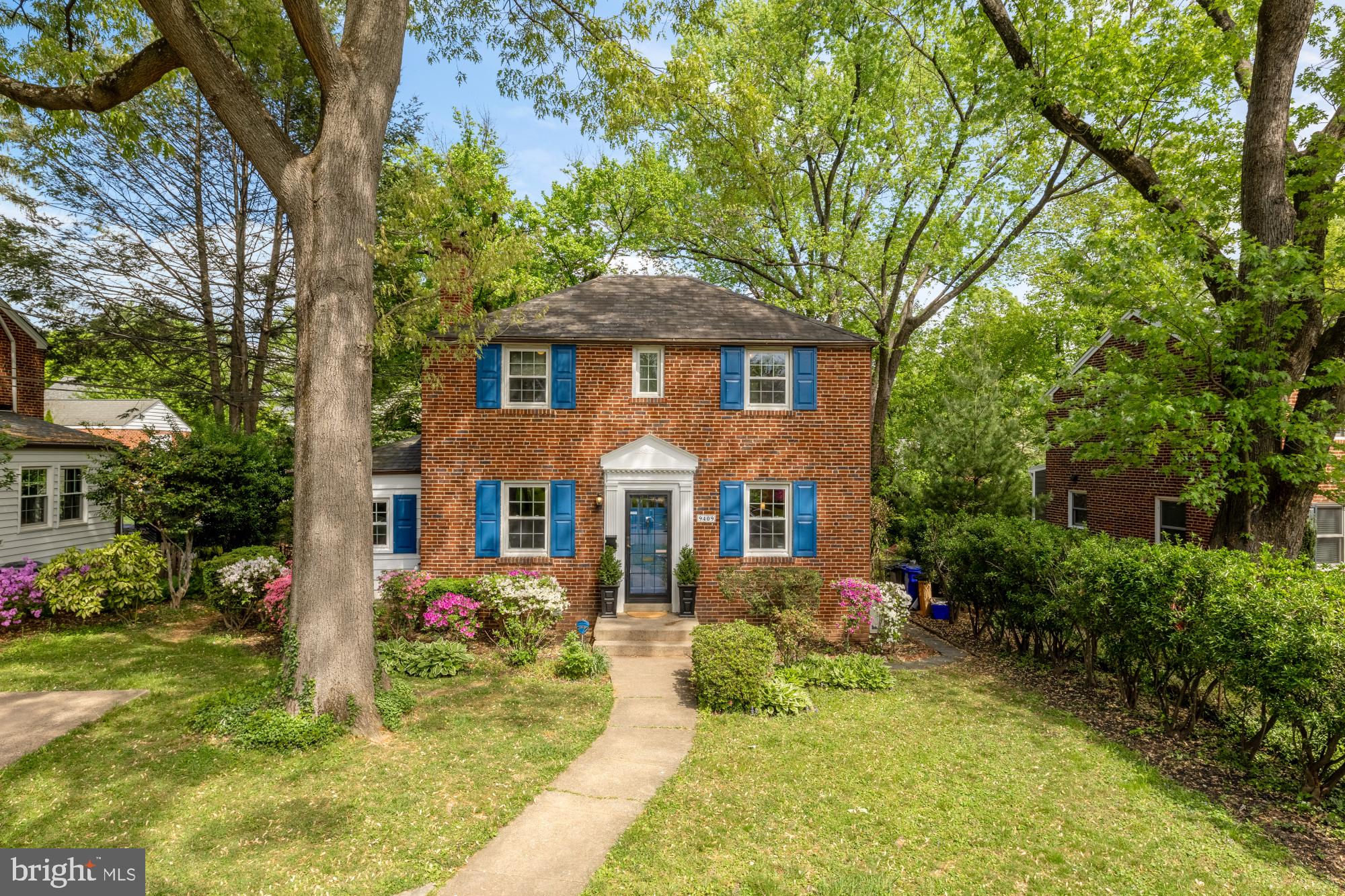 Tucked along a quiet, tree-lined street, this classic brick colonial offers the best in timeless character, comfortable living spaces paired with an exceptional outdoor less than one block from shopping & dining and easy access to downtown Silver Spring & Metro!

Inside, the main level offers amazing living space with a bright and welcoming living room with recently refinished hardwood floors and a cozy fireplace, a den perfect for home office, gym, playroom or wellness space. The layout flows naturally into a dedicated dining area and a spacious renovated kitchen with beautiful wood cabinetry and ample counter space, ideal for everyday living and easy entertaining.

Upstairs, 3 well sized bedrooms & 2 baths provide a comfortable retreat with natural light and functional layouts. The hall bath features a tub & the en suite primary bath features a great shower with herringbone tile floor.

The lower level adds valuable additional space, offering room for recreation, hobbies, guests, or a home office, along with extra storage and everyday functionality. Beautiful built ins add character and the additional full bath with tiled shower and towel warmer are a true bonus.  Spacious laundry area & walkout to the backyard.

Step outside and discover one of the home’s standout features, a deep, expansive backyard surrounded by mature trees and natural greenery. This outdoor space offers incredible room to spread out, whether for play, gardening, entertaining, or simply enjoying the peaceful setting. A patio area and open lawn create the perfect backdrop for gatherings, while the yard’s depth and privacy make it feel like a true retreat.

Additional highlights include a detached storage shed, updated systems including NEW PLUMBING throughout the home completed just a few years ago, and a layout that blends charm with practicality throughout.

Ideally located just moments from parks, shopping, dining, and Metro access, this home offers the perfect balance of neighborhood tranquility and everyday convenience. Walk to grab groceries at the well loved neighborhood grocery store Sniders or Aldi.  Grab a glass of wine at the urban winery or dinner at Lime & Cilantro. A wonderful opportunity to own a character-filled home with a spacious yard and flexible living space in one of Silver Spring’s most desirable settings.