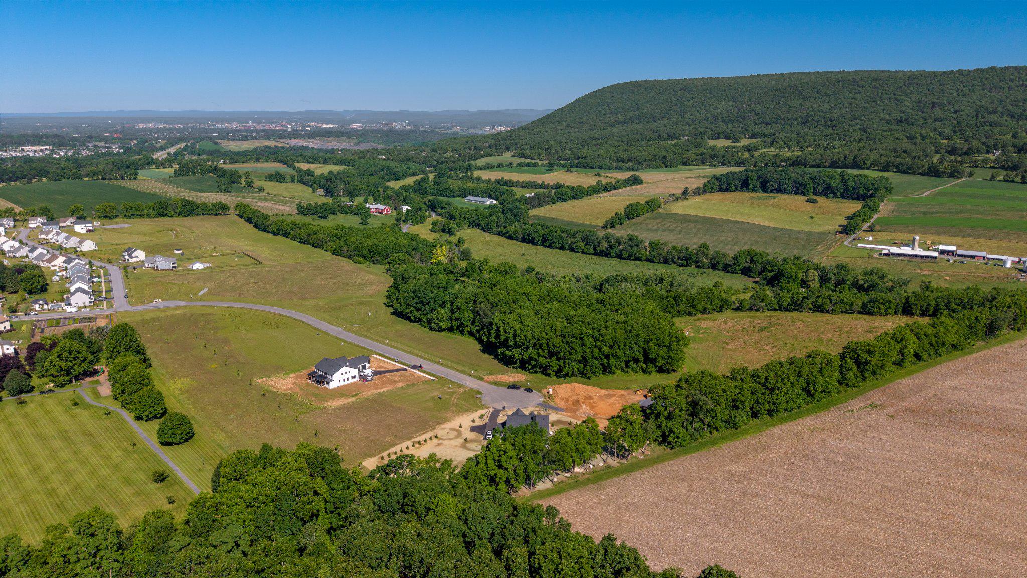 Welcome Home to Kaywood North Estates! Located minutes from the historic town of Boalsburg and 15 minutes from downtown State College and Penn State University, Kaywood North Estates provides peaceful country living close to the amenities you desire. With spectacular views of Mount Nittany, rolling hills and beautiful country meadows, Kaywood North Estates is a beautiful setting to build your new home.  This lot backs up to the spacious Kaywood Park providing an great extension to the property with walking trails, playground and open space.  Open to all builders.