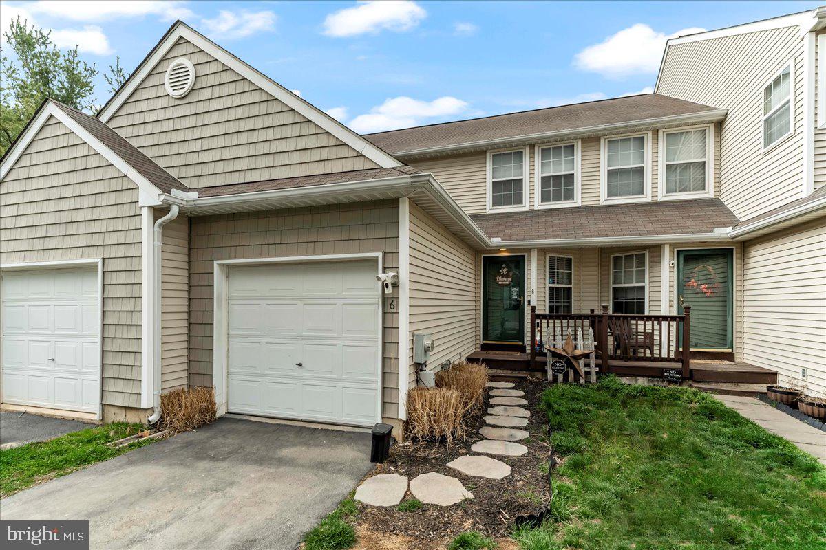 Looking for a spacious townhouse in popular Spring Brook Village?  Look no further! This beautiful home offers the perfect combination of comfort and style. Featuring 3 spacious bedrooms and 2.5 bathrooms, this property is perfect for families or anyone looking for extra space.  The kitchen was just remodeled with new lower cabinets, granite counter-tops and ceramic tile floor.  Plus appliances are included!
The finished basement provides additional living space for a home theater, office, or play area, while the inviting deck offers stunning views – ideal for outdoor entertaining or relaxing in privacy. With a one-car garage, you’ll have plenty of space for parking or extra storage.