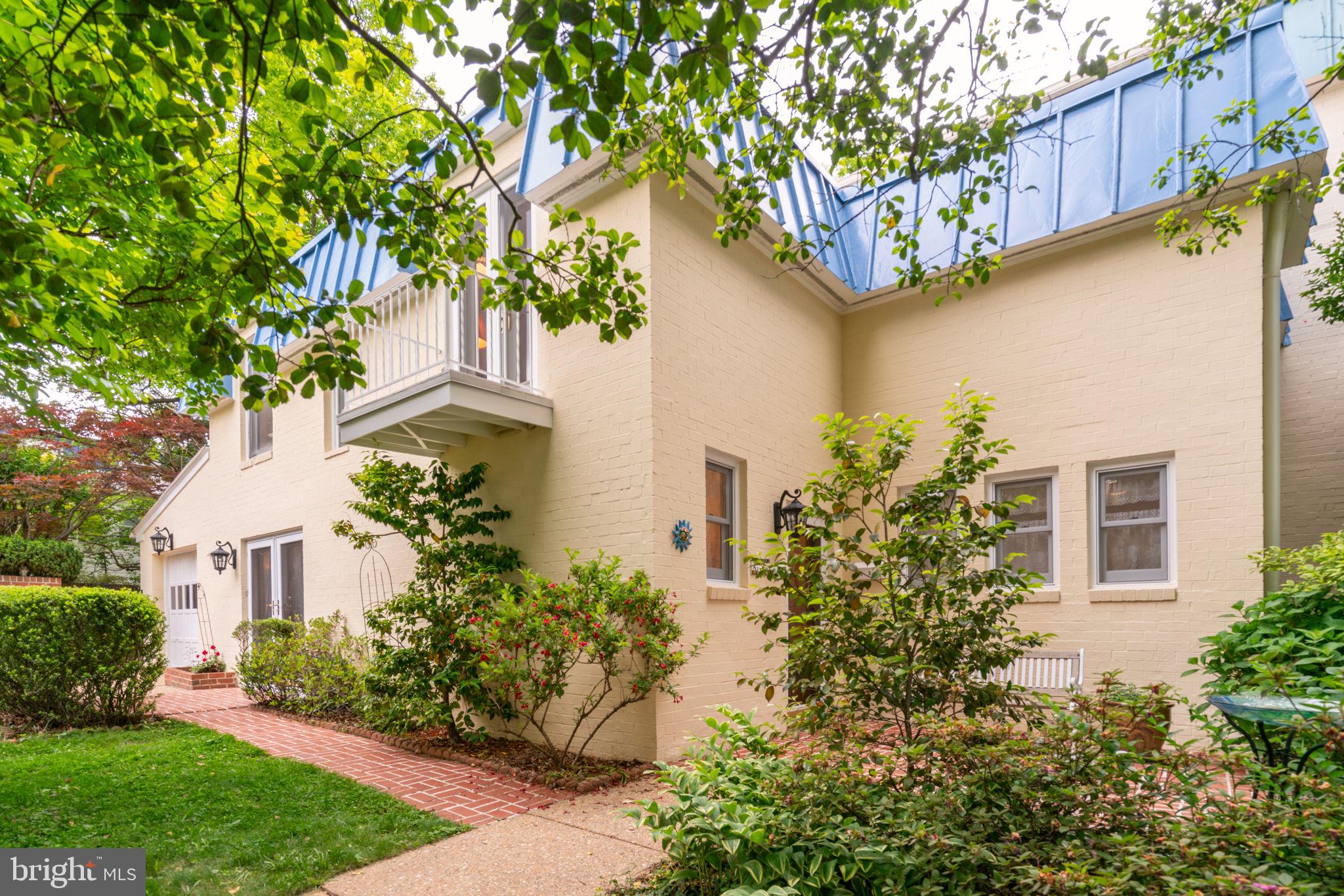 Major Price Improvement! Completely charming 2-level brick townhome nestled on one of the prettiest lots. This solidly built residence sits on a generous .12  acre lot with a secret garden backyard oasis — perfect for relaxing, entertaining, or gardening. All with NO HOA!
Step inside to beautiful parquet flooring throughout the main level, featuring a spacious living room with cozy gas fireplace, separate dining area, and large kitchen ideal for everyday living and gatherings. Upstairs, oak hardwood flooring graces all three bedrooms, complemented by two updated full bathrooms, an abundance of natural light, a sweet private balcony, and generous closet space.
Additional highlights include a one-car attached garage, gas fireplace and situated on a friendly cul-de-sac. Just steps from everything Falls Church City offers: Whole Foods, Harris Teeter, boutique shops, restaurants, the community center, library, and the W&OD Trail. Enjoy quick access — approximately one mile to East Falls Church Metro — plus easy commuting via Routes 66 and 495. 
This home combines classic charm, thoughtful updates and unbeatable walkability in one of Northern Virginia’s most desirable small-city communities. Don’t miss this opportunity!