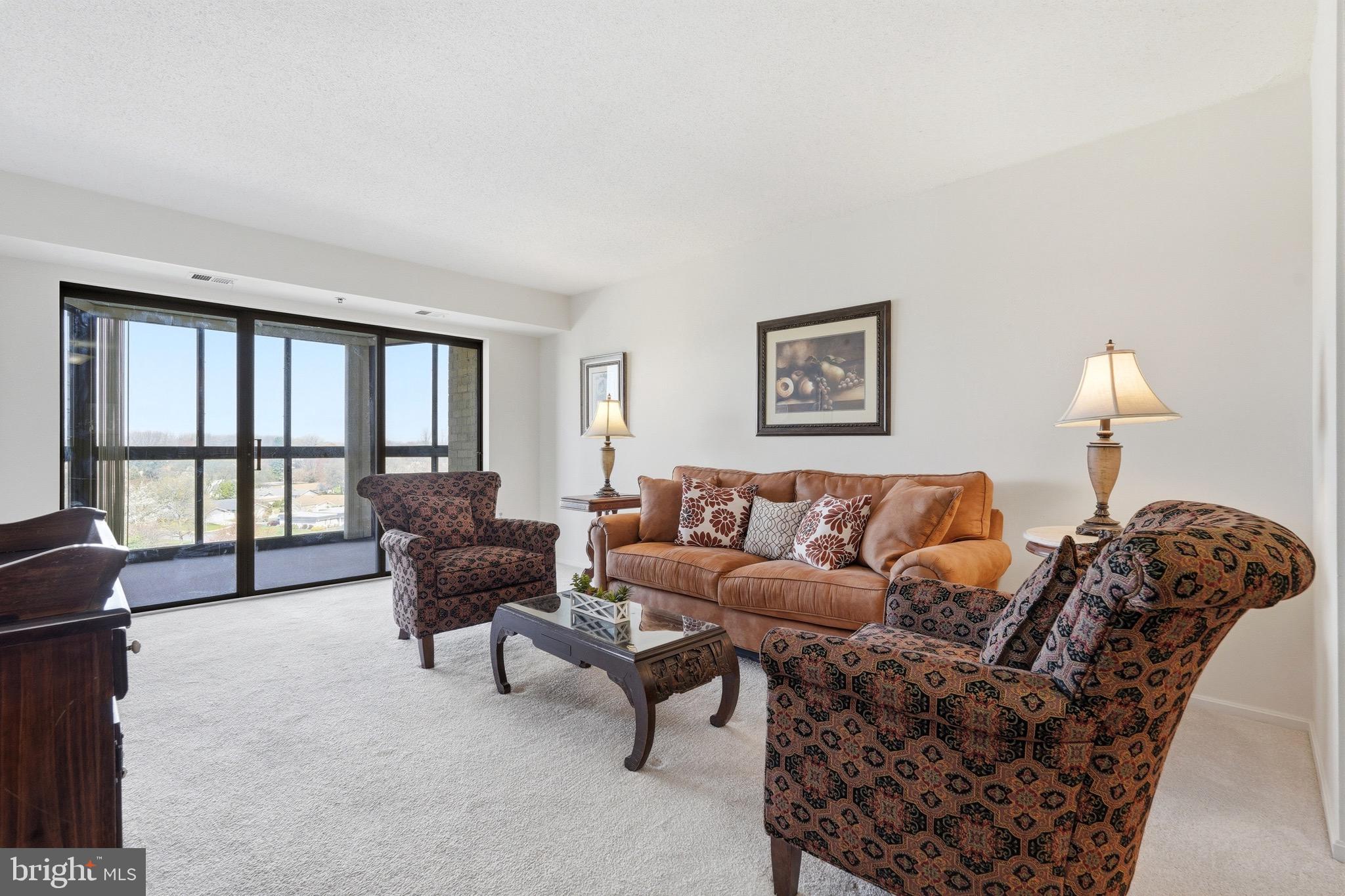Welcome to Unit #712 at Fairways South, located in the highly desirable Leisure World 55+ gated community. This well-maintained 2-bedroom, 2-bath condo offers a bright, open layout with a spacious living and dining area and an enclosed sunroom, perfect for year-round enjoyment with peaceful views.
The thoughtfully designed split-bedroom floor plan provides privacy, featuring a comfortable primary suite with en-suite bath and a generously sized second bedroom with its own full bath, ideal for guests or a home office. Additional highlights include in-unit laundry, extra storage, and ample parking.
Enjoy a vibrant, amenity-rich lifestyle with access to clubhouses, indoor and outdoor pools, fitness center, tennis and pickleball courts, on-site dining, and more. Condo fee includes water and basic cable.
Secure, convenient, and low-maintenance living at its best. Don’t miss this opportunity!