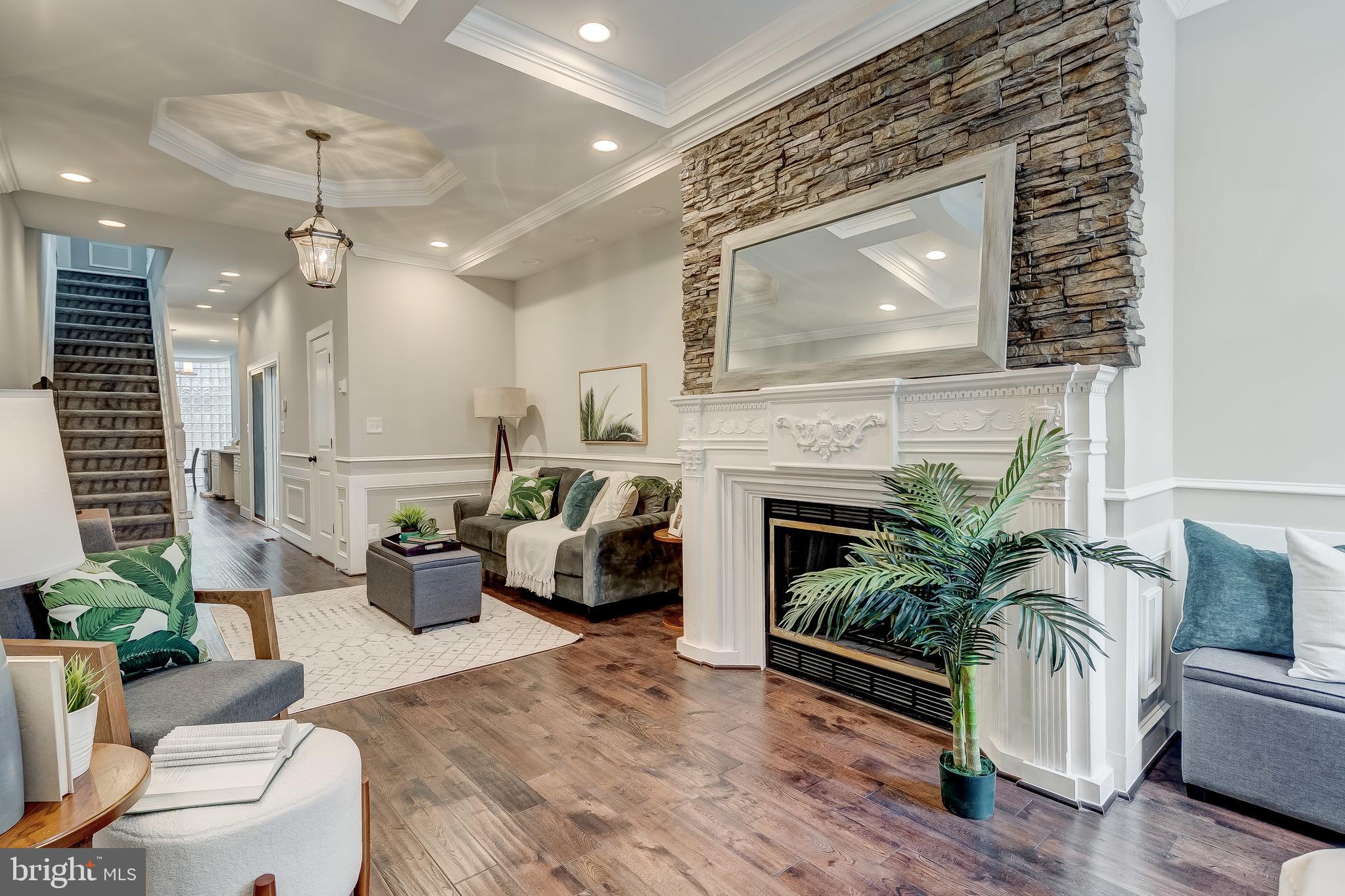 NEWLY RENOVATED 16 FT WIDE 3-STORY LOCATED IN THE HEART OF FEDERAL HILL. GLISTENING HARDWOODS CASCADE THROUGHOUT. ENJOY CUSTOM CABINETRY, UPGRADED TRIM AND PAINT PACKAGE, IMPORTED TILE, GRANITE COUNTERTOPS, SS APPLIANCES IN DESIGNER CHEF'S KITCHEN. OPEN FLOOR PLAN. TONS OF NATURAL LIGHT. FINISHED LOWER LEVEL. HIGH CEILINGS. TONS OF STORAGE. WALK-IN SHOWERS. WALK-IN CLOSETS. FIREPLACE. DUAL MASTER SUITES. SPACIOUS 4 BEDROOMS WITH 2.5 BATHROOMS. 3 BEDROOMS ABOVE GRADE. PRIVATE DEN/OFFICE LOCATED ON THE THIRD STORY. EXPANSIVE DECK FOR ENTERTAINING. CLOSE PROXIMITY TO RETAIL SHOPPING, LOCAL DINING, PATTERSON PARK, AND ALL MAJOR HIGHWAYS. SCHEDULE A PRIVATE TOUR TODAY!
