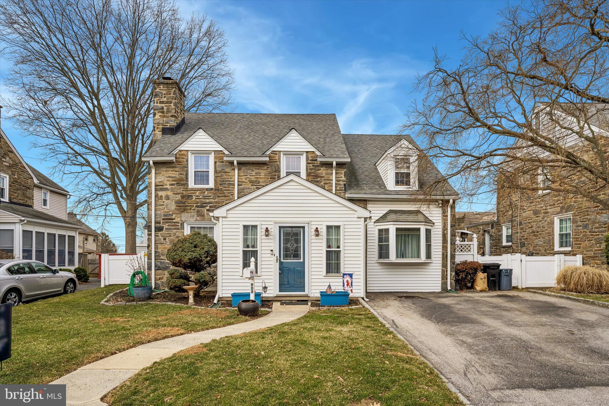 Welcome to 908 Roberts Ave. a charming, spacious, and beautifully maintained home on a picturesque street just one block from Aronimink Elementary School. Step inside through one of the home’s two glass front doors into a bright, enclosed, heated front porch complete with a coat closet and coat nook. The first floor offers a highly desirable first-floor bedroom, featuring a bedroom, large closet, and a private bath with soaking tub and separate shower. The formal living room is warm and inviting with a brick, wood-burning fireplace and deep window sills found throughout the home. A sun-filled formal dining room provides an ideal setting for gatherings and entertaining. The newer kitchen is both pretty and practical, featuring granite countertops, a 5-burner gas range, coffee corner, and a charming breakfast nook. An exterior door leads to a paver patio, large shed, fenced yard, and privacy fencing, perfect for outdoor enjoyment. The finished basement has been fully waterproofed with a French drain system and offers excellent additional living space, a laundry room, powder room, large storage closet, utility room, gas heater, central air, and 200-amp electrical service. The second floor includes three bedrooms, highlighted by a generously sized primary bedroom with two large closets and stairs to a floored attic for storage. Two additional bedrooms and a newer hall bath with tub shower and a linen closet. Additional features include replacement vinyl tilt-in windows throughout, newer bathrooms on both the first and second floors, central air & gas heat, and driveway parking for two cars. Bright, cozy, and full of character, this home offers exceptional flexibility, space, and location. A truly special opportunity in Drexel Hill that buyers will love.