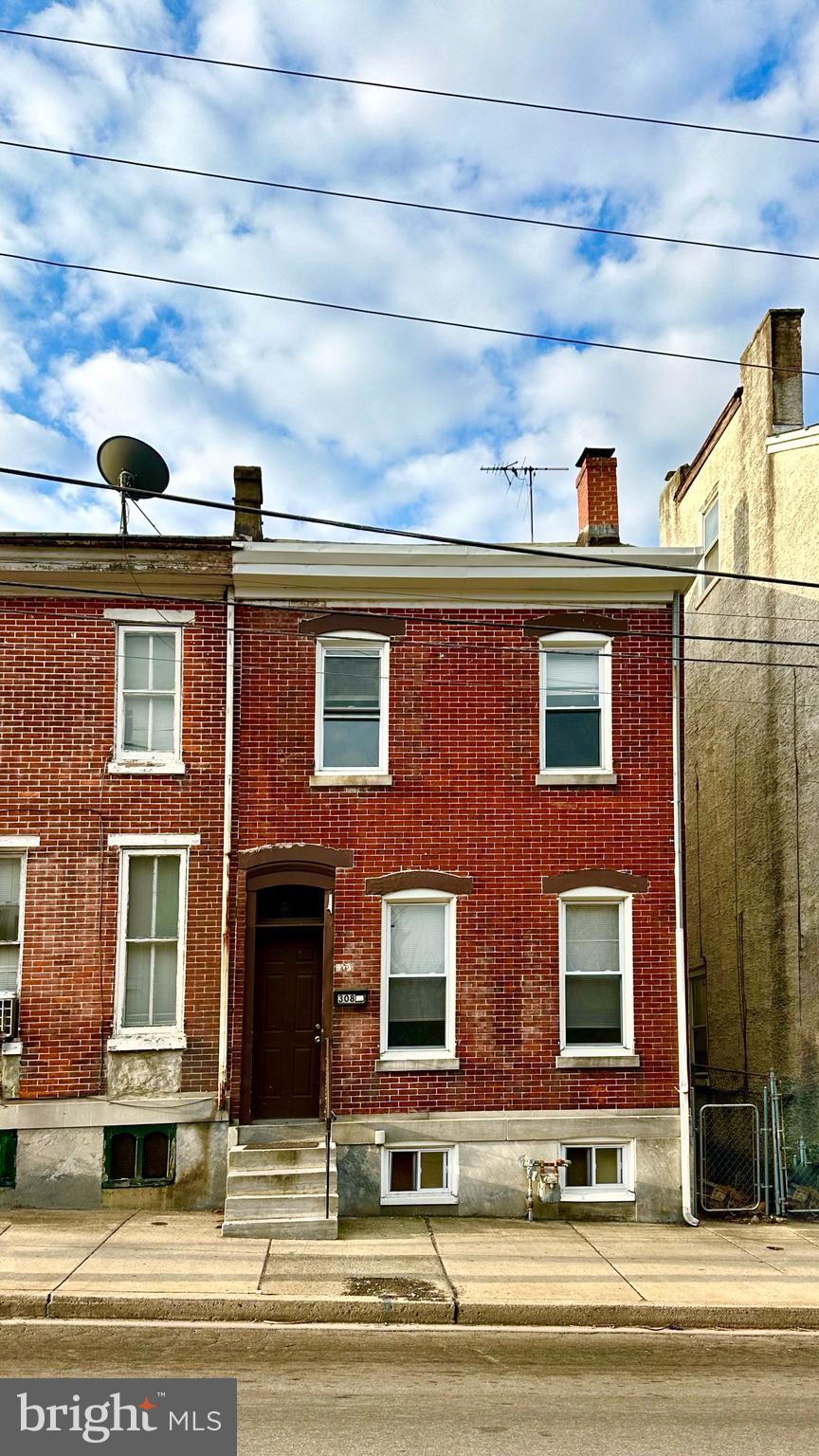 Come and see this newly renovated move-in-ready property located on the quiet side of Marshall Street. The red brick front end unit with marble steps leads you into the spacious and beautiful living room with a marble fireplace and the cased columns.  It offers the open, well-lighted modern look and the convenience of large living space on the first floor.  Behind the living room is a large dinner room where family dinner and holiday gathering take place.  The kitchen with new appliances is large enough to easily create a dining area. Every bedroom is large and with nature light, especially the loft.  High-quality waterproof and scratch-resistant flooring throughout the entire house.  All windows are 2023 new.   Walking distance to Norristown town center and the Transit Center.  Just a few minutes to King of Prussia, Rt. 76 and PA Turnpike. Fenced-in backyard and surrounded in a clean quiet neighborhood on a large street with ample parking. Make it your home sweet home or add it to your investment profile, you will not be disappointed.
