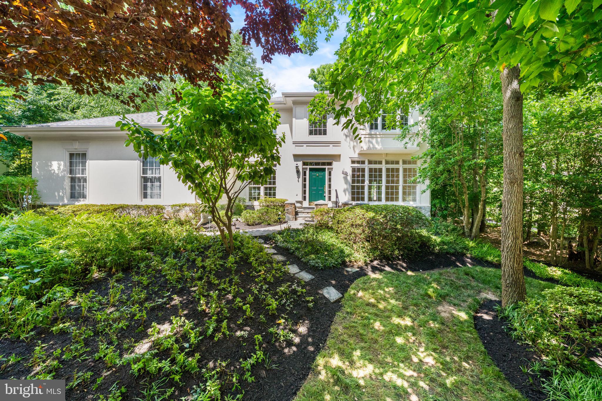 Welcome to 10324 REGENCY STATION DRIVE, an extraordinary Stanley Martin home nestled on Cul-de-Sac private lot in the highly sought-after Edgewater/Regency Station community of Fairfax Station. Featuring 4 spacious bedrooms 4 1/2 baths and a versatile lower-level flex room, this beautifully maintained residence offers over 5500+ square feet on three finished levels of elegant living space. Freshly updated with newly refinished hardwood floors, new carpeting and modern neutral paint throughout, the home impresses from the moment you enter the dramatic two-story foyer. The main level showcases an open floor plan with extensive crown and chair rail moldings, Palladian windows, a private home office, formal living and dining rooms, and a stunning two-story family room with a gas fireplace. The gourmet chef's kitchen is the heart of the home, featuring quartz countertops, stainless steel appliances, wall oven & built in microwave, 42-inch solid wood cabinetry,  pantry, desk area  and abundant prep space. The adjoining sun-filled Morning room provides the perfect place to relax with gorgeous views of your welcoming rear yard. Enjoy year-round outdoor entertaining on the expansive deck and flagstone patio overlooking a scenic backyard surrounded by mature trees for exceptional privacy. Upstairs, the luxurious primary suite offers tray ceiling, dual walk-in closets, and a beautiful spa-inspired bath with separate vanities, granite countertops, soaking tub, frameless glass shower designed with custom tile work. Three additional bedrooms include a private en-suite bedroom and a Jack-and-Jill bath configuration complete the upper level. The walk-up lower level is ideal for extended living, recreation, or guests, featuring a large recreation room, exercise space, bonus/flex/5th Bedroom (NTC), full bath and abundant storage area. Additional conveniences include a 3-Car Garage with extended driveway for extra parking; in-ground irrigation system and ADT pre-wired security system.  Ideally located just moments from Fairfax County Parkway and Route 123, Edgewater/Regency Station residents enjoy easy access (walking distance!) to Burke Lake Park, Burke VRE, Springfield/Franconia Metro, shopping, dining, and everyday conveniences. This exceptional home combines luxury, privacy, and convenience in one of Fairfax Station's most desirable neighborhoods--10324 REGENCY STATION DRIVE welcomes you HOME!