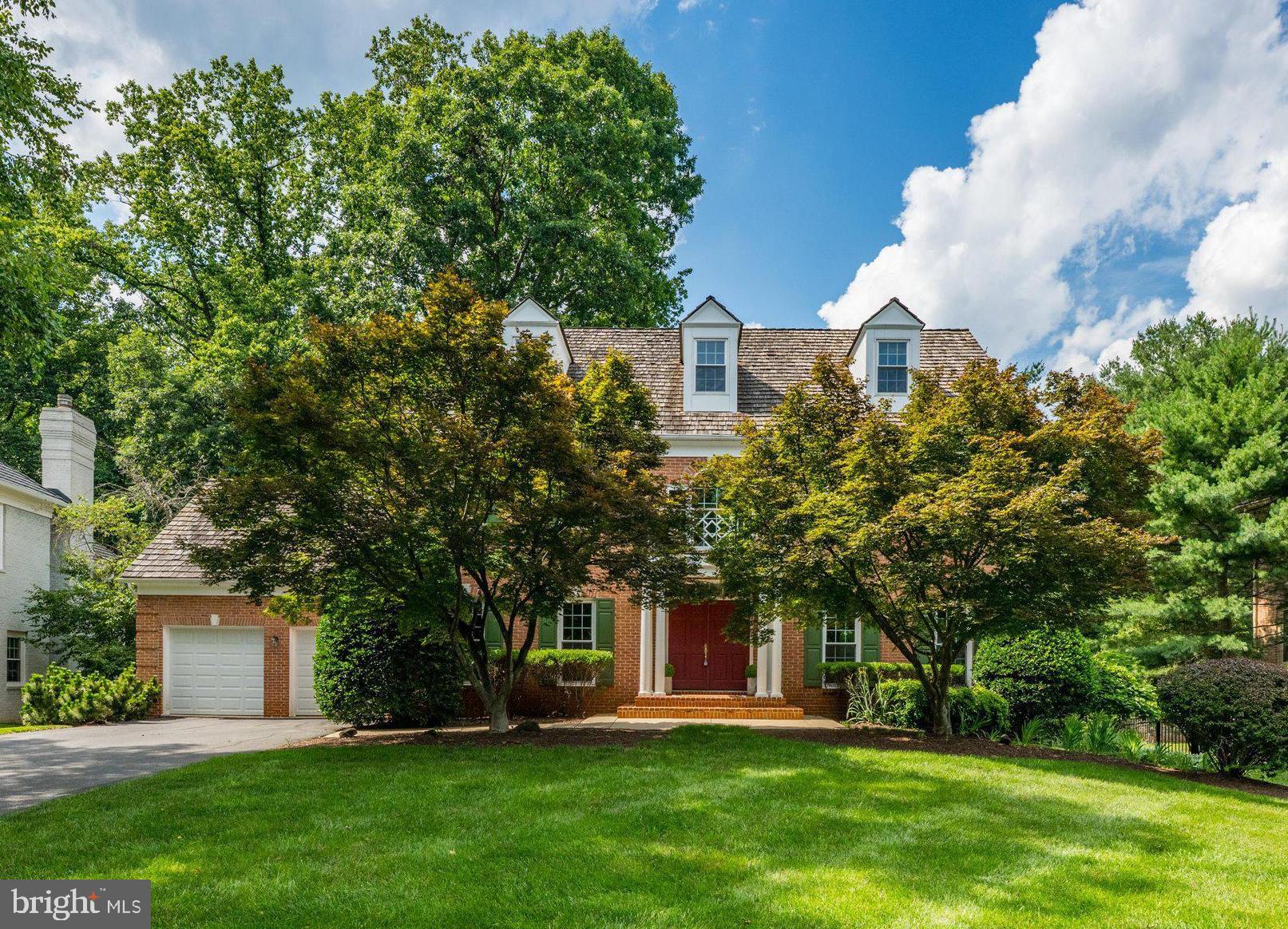 Tucked away on a quiet cul-de-sac in the prestigious Eagle Ridge at AVENEL neighborhood, this beautifully crated handsome brick colonial offers the perfect balance of classic style, generous living spaces and everyday comfort.  A dramatic two story entry foyer welcomes you into sun-filled interiors highlighted by high ceilings, hardwood floors, extensive millwork and an effortless floor plan designed for entertaining and relaxed family living.  The natural wood Kitchen features abundant cabinetry, a center island/breakfast bar and an inviting breakfast room that opens seamlessly to the step down Family room with a wood burning fireplace.  Enjoy easy access to the upper rear deck - a perfect place to tuck away with a good book!  A private main level office/study offers the ideal work-from-home retreat.  The Upper Level is anchored by a spacious Primary Suite, complete with a separate Sitting Room/2nd Office/Nursery, oversized walk-in closet and renovated spa inspired bath.  Two generously sized secondary bedrooms offer comfort and privacy for family and guests and completes the second level.   The versatile 3rd floor is a wonderful surprise, offering endless possibilities as another big bedroom suite, home office or the ultimate teenager's hideaway.  Complete with a full bath and an exceptionally large walk-in closet outfitted with custom shelving, this flexible space is ready to adapt to your lifestyle! The phenomenal daylight, walkout lower level lives like a private residence of its own.  Thoughtfully designed for multi-generational living, extended family, an au pair or long terms guests, it features a second full kitchen, spacious living and dining areas, a study (addt'l bedroom?) with a cozy fireplace, and a full bath. Easy access to the expansive rear deck creates a natural extension of the living space, inviting you to entertain friends or simply unwinding while overlooking the serene, peaceful backyard.  Privately situated on the other side of the lower level is a generous bedroom suite with its own sitting room and en suite full bath.  Whether welcoming aging parents, hosting family for extended visits, or giving a recent graduate a comfortable place to save for that first home, this exceptional space offers remarkable flexibility without sacrificing privacy.  The location is every bit as exceptional as the home itself.  Perfectly positioned  between Reagan National and Dulles International Airports, you'll enjoy remarkable convenience  for business and leisure travel alike.  Just moments away, Great Falls Park offers miles of scenic trails, breathtaking overlooks, making it easy to feel as though you've escaped  for the weekend- while remaining less than a mile from home.  Commuting is equally effortless with quick access to downtown DC, Tyson's Corner or north to the I-270, BioMed Corridor via the Capital Beltway.  In addition, this property is ideally situated in the nationally acclaimed Whitman School Cluster, consistently recognized among the nation's finest.  Residents of AVENEL enjoy an outstanding lifestyle with gorgeous grounds, exceptional HOA amenities including the swim/tennis/pickleball club, walking paths and playgrounds.  This is luxury living that truly offers the best of both worlds - an exceptional home, an extraordinary community and an unbeatable Bethesda location!  Make it yours today.