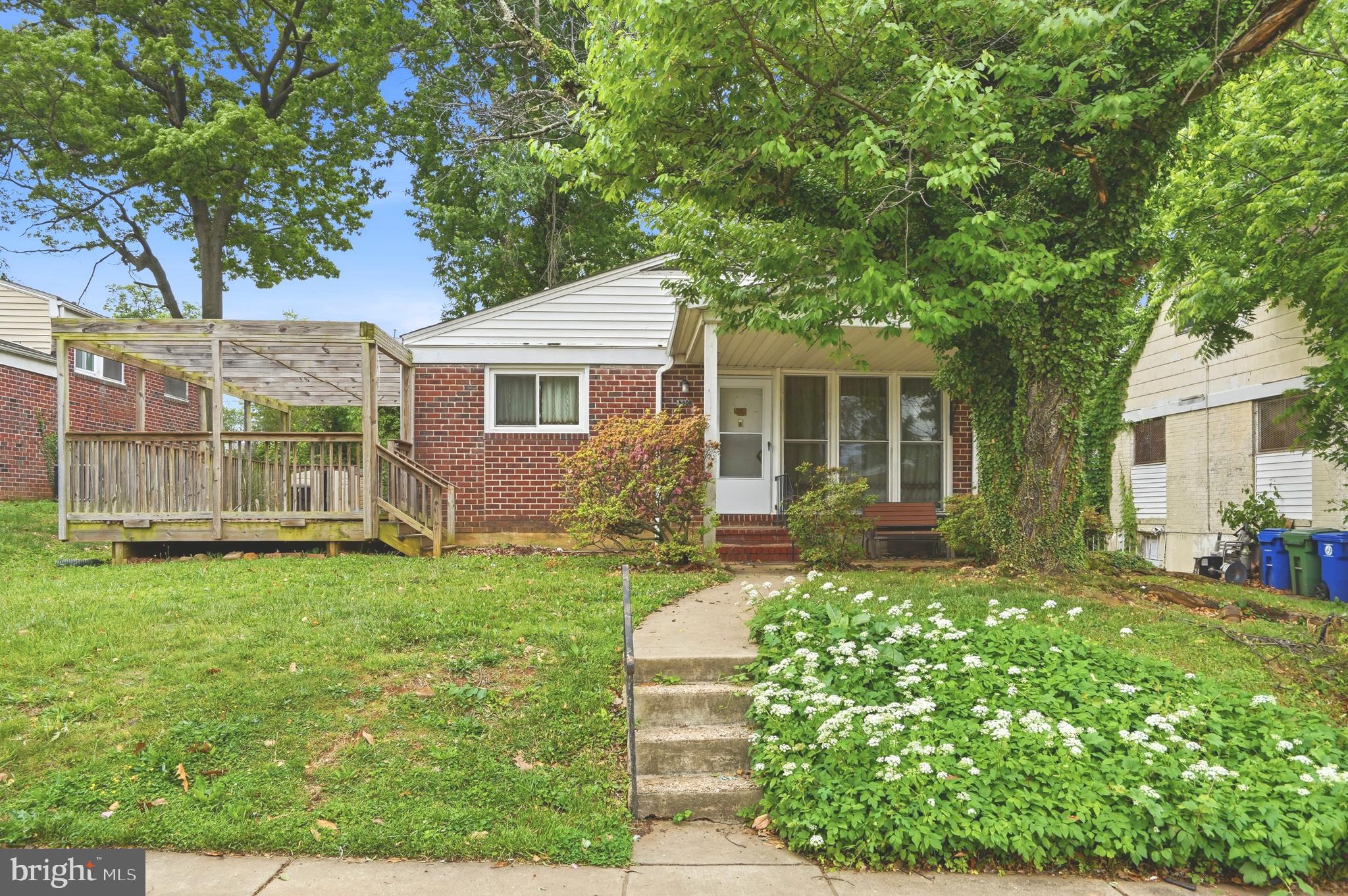 Welcome to this charming brick home full of opportunity and character! Nestled on a spacious lot with mature trees, this property offers the perfect blend of indoor space and outdoor potential. The inviting front porch and large side deck provide great areas for relaxing or entertaining. Inside, you’ll find a functional layout featuring multiple living spaces, including a bright main living area and a generously sized lower level, perfect for a rec room, home office, or flex space. The kitchen offers ample cabinet storage and room to customize to your taste. Upstairs, the home features three spacious bedrooms with natural light throughout, including a primary suite, along with a second full bathroom complete with a tub/shower combo. Step outside to a private backyard with plenty of room for play, gardening, or future enhancements. The existing deck adds great outdoor living space, while the lot provides endless possibilities. This home is ideal for buyers looking to add their personal touch. With solid bones and great space inside and out, it’s a fantastic opportunity to create your dream home. Updates include roof (2023), HVAC (2017), water heater (2024), windows (2021 and 2023) deck (2018), shower and tub (2023). Conveniently located near shopping, dining, and major commuter routes, don’t miss your chance to make this home your own!