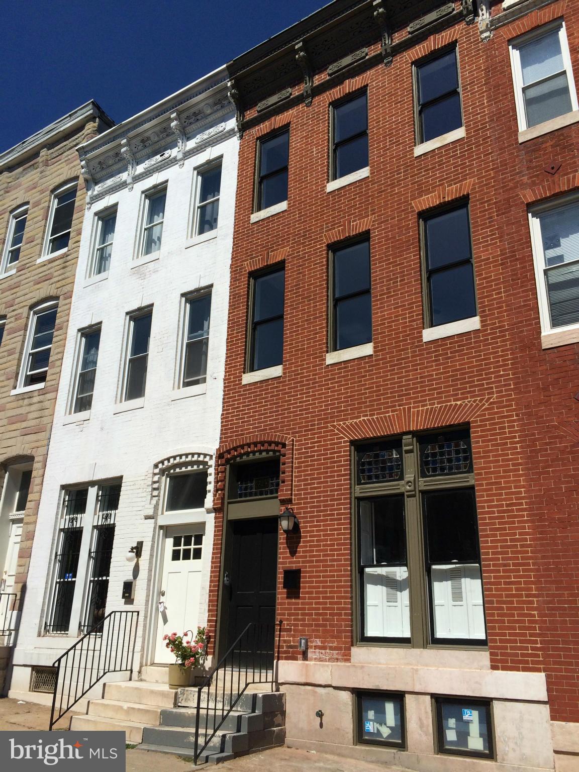 Top to bottom renovation of this historic Station North home! 3rd flr master suite, walk-in closet, full bath, two bdrms + den/office, full bath and laundry on 2nd floor, living room and kitchen have historic mantels and other original details. Living room has original stained glass transoms. INCENTIVES::CHAP Tax saves $7k+ yr for ten years, Hist Tax Credit approx $40k, V2V $10k, JHU LNYW $23k