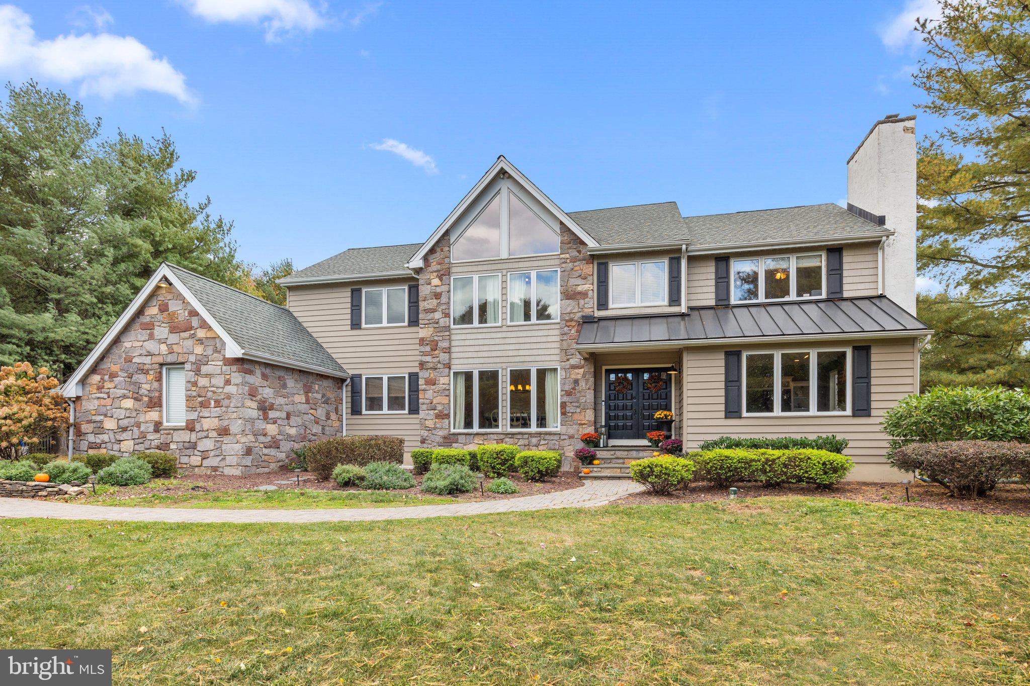 Elegant and Sophisticated! Two-Story Center Hall with Four Bedrooms and 2.5 Bathrooms situated on 1.5+ acres of picturesque grounds and located on a tree-lined street with cul-de-sac in the heart of Bucks County. Council Rock School District. 4200 square feet… considerable room sizes and expansive open floor plan for entertaining. Gourmet kitchen with white cabinetry, granite countertops, stainless steel appliances, designer range hood, subway tile backsplash, wall mount pot filler, and beverage center. Center Island with overhead pendant lighting and breakfast room with plenty of windows can double as a sunroom. Two floor-to-ceiling fireplaces with stone surround; one fireplace in the formal living room and fireplace #2 in family room accented with high cathedral ceiling, angled windows to maximize light and views, and ideally positioned off Kitchen with access to huge deck. Hardwood floors throughout the first and second floor. Dining room with recessed lighting and views of front yard landscape. First floor office and laundry room. Powder room with craftsman style Wainscoting. Master Bedroom with vaulted ceiling and sitting room overlooking front yard includes dressing area, walk-in closets and completely updated Master Bathroom with vaulted ceiling, oversized shower, deep soaking tub, two vanities and private deck with views of a well-manicured lawn with established trees, shrubs, and plantings. Upstairs are three additional nicely sized bedrooms sharing a newly renovated hall bathroom and having plenty of closet space. Lower level is partially finished as recreation room /playroom with wall-to-wall carpeting, drop ceiling, and panel lighting in addition is an abundance of storage in the unfinished area and steel Bilco doors to the outside. Oversized 3-Car Garage. Whole house generator. Recent updates include Roof, Siding, Skylight, Casement windows, Hardwood floors, Kitchen cabinets, countertops, tile work and appliances, Decorative moldings, Propane water heater, Hall bathroom, Split-rail fence, Interior doors, Well pump, Master bathroom, and Generator. Around the corner you will enjoy a Family-run farm offering produce, baked goods & preserves, plus pick-your-own fruits & vegetables.